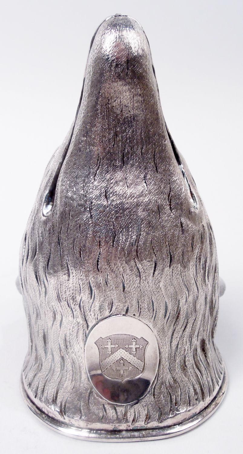 George III sterling silver stirrup cup. Made by Charles Aldridge & Henry Green in London in 1782. A fox head with pointed snout and erect folded ears; intense eyes and closed mouth. The expression suggestive of silent loping through the forest.