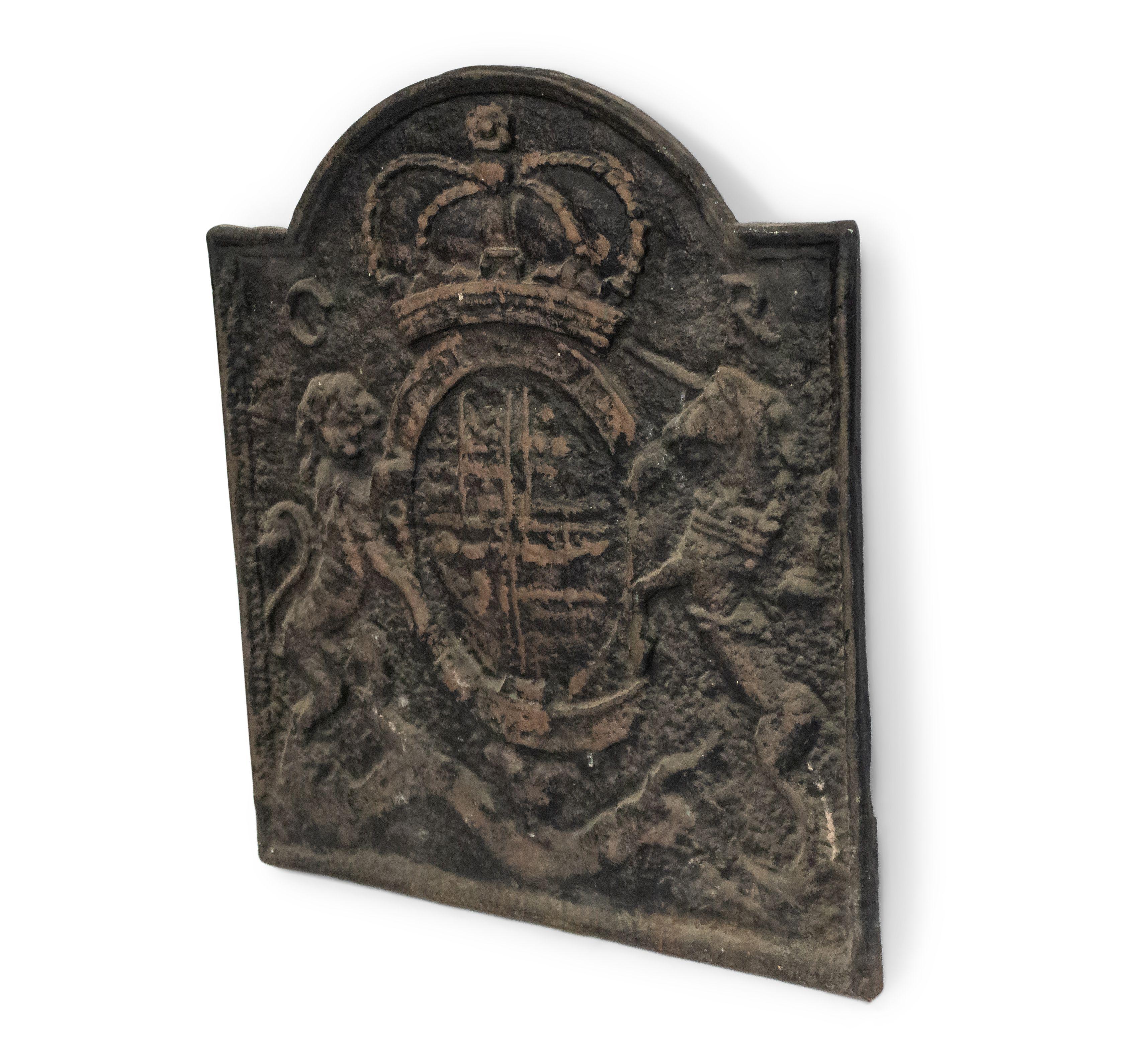 English Georgian style (19th century) cast iron coat of arms wall plaque / fireplace back with rounded top.
