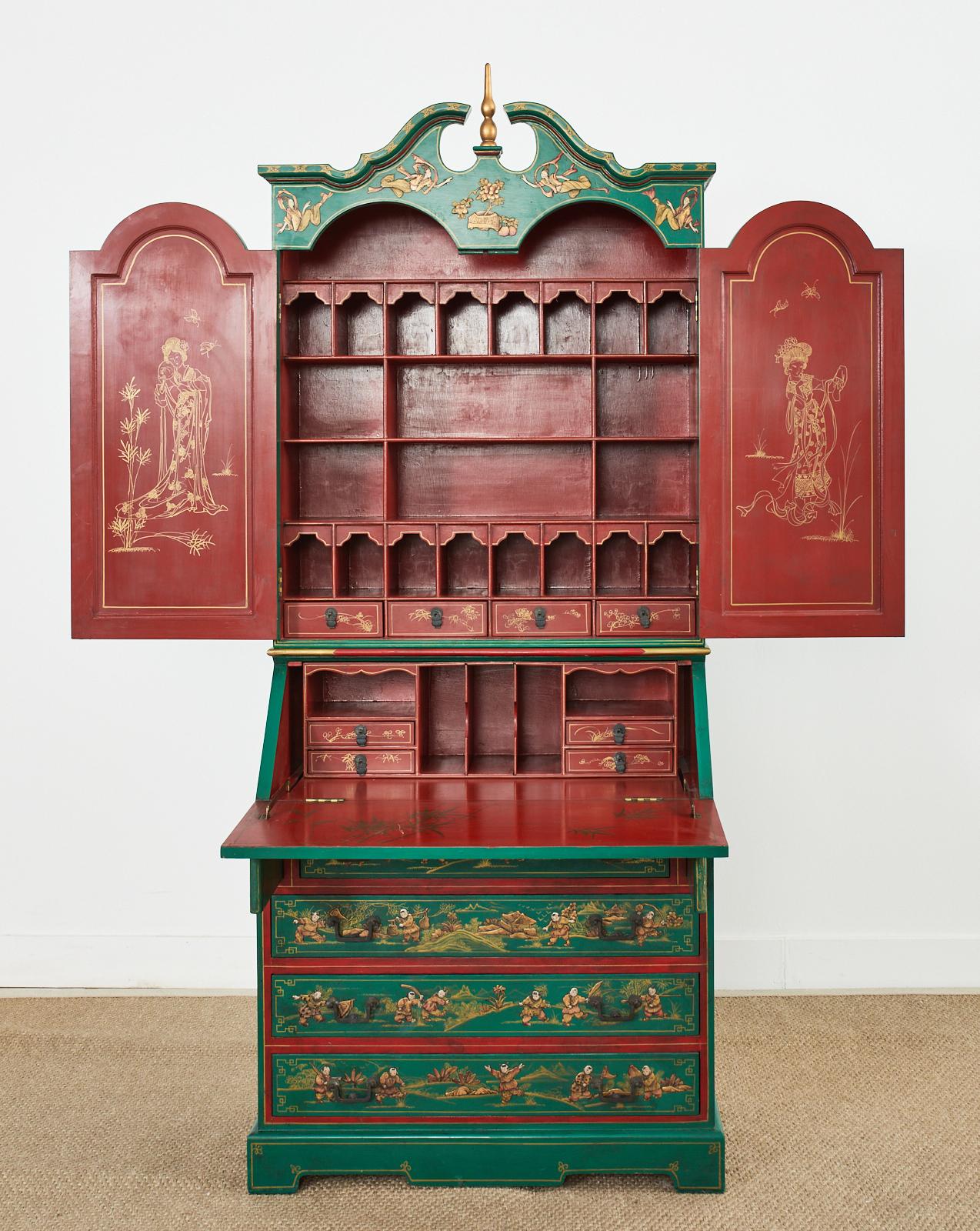 Brilliant English George III style secretaire bookcase featuring a polychrome parcel gilt lacquer finish. The two-part case is decorated in the Chinoiserie revival style with idyllic Asian scenes of figures amid pagoda landscapes engaged in