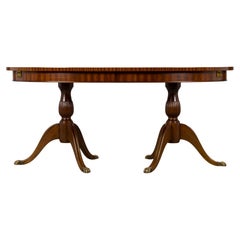 English Georgian Style Extendable Mahogany Double Pedestal Oval Dining Table