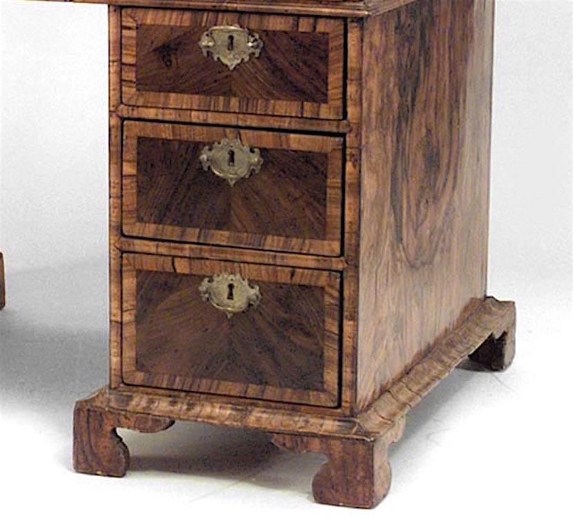 English Georgian style (18/19th Century) burl walnut kneehole desk with 9 drawers.
