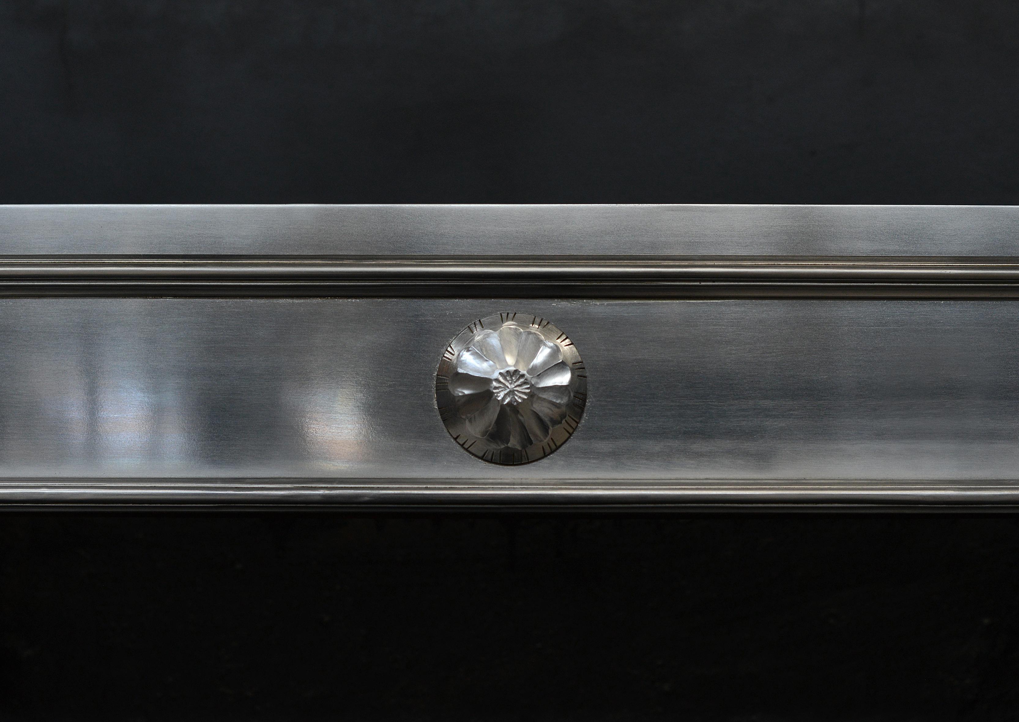 A Georgian style steel register grate. Fluted fret, urn finials and plain circular patera to centre. The size of 38in x 38in (965mm x 965mm) has a little tolerance if needed.. Please do call to discuss if your opening size is slightly different from