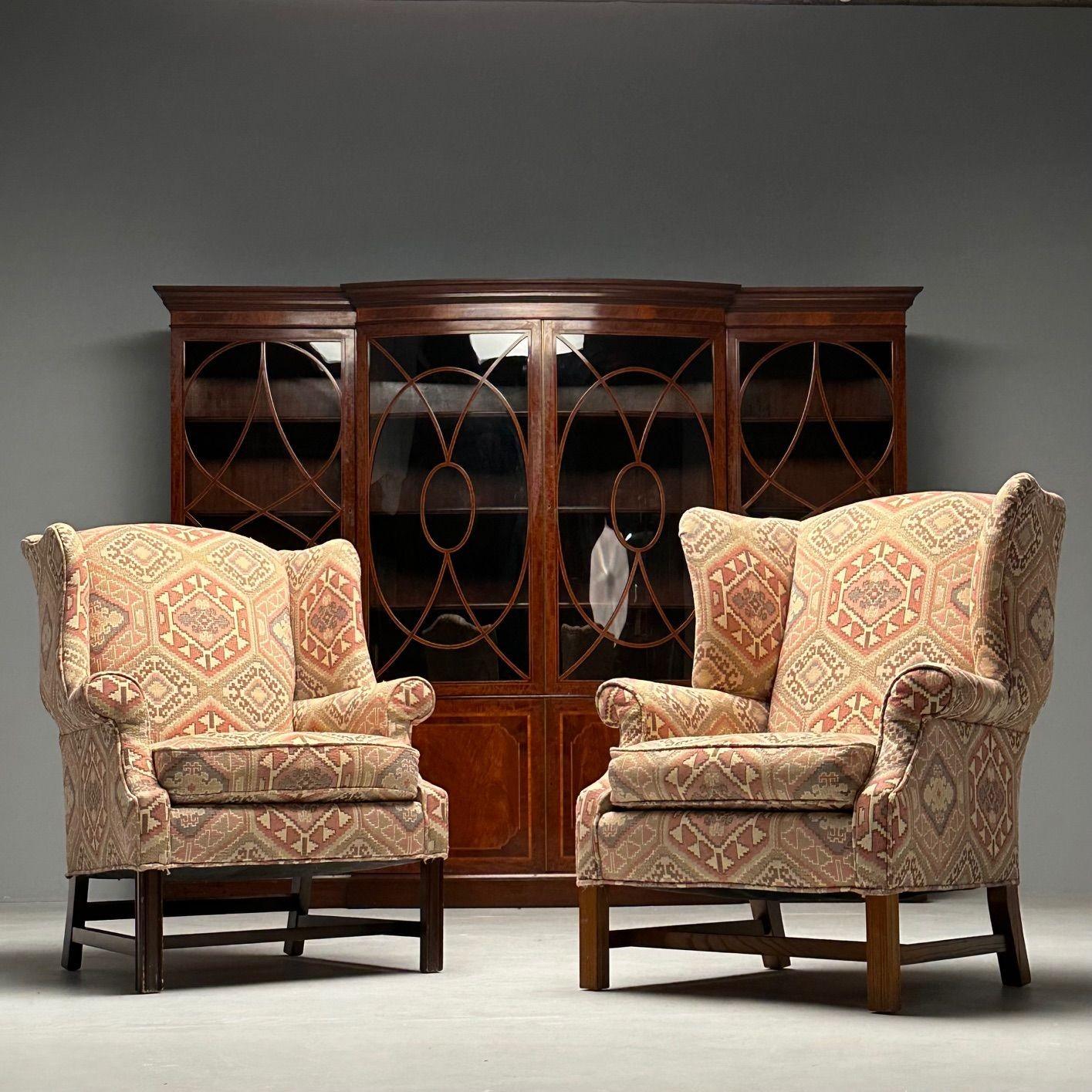 English Georgian Style, Wingback Arm Chairs, Pink Aztec Print, Tapestry Fabric, 2000s

Compatible pair of Georgian style wingback armchairs having pink and beige textile patterned fabric. Each example features a slightly different wooden base with
