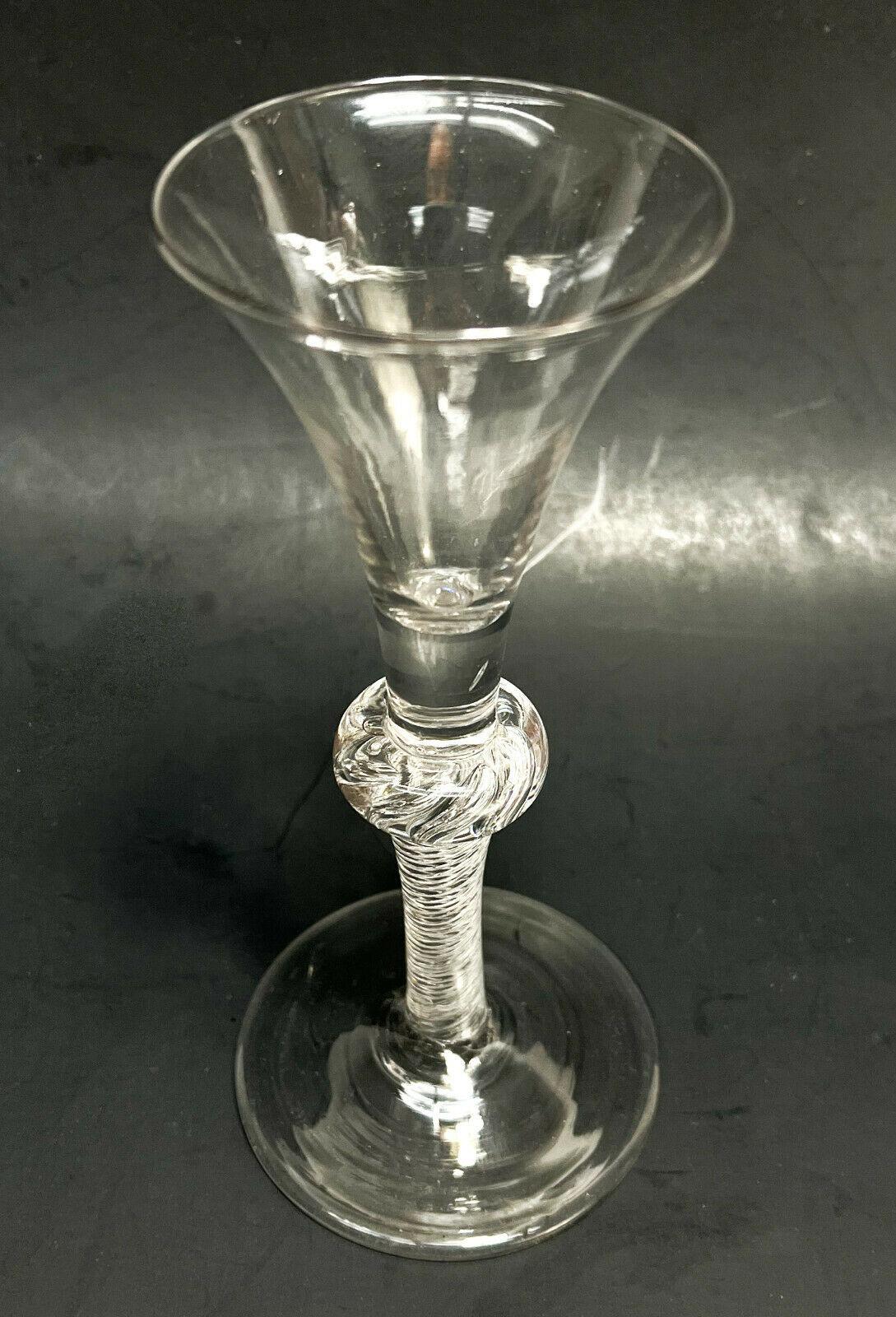 English Georgian Wine Goblet, Air Twist Stem, 18th century

Additional information:
Style: Victorian 
Material: Glass
Type: Wine Goblet 
Color: Clear
Lid Type: Twist 
Glassware Type: Wine Glass
Brand: Unmarked 
Set Includes: Goblet
Time