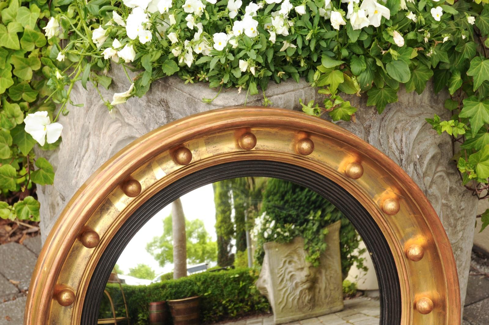 19th Century English Gilt and Ebonized Wood Girandole Bull’s-Eye Convex Mirror, circa 1870