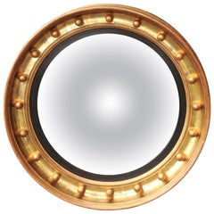 English Gilt and Ebonized Wood Girandole Bull’s-Eye Convex Mirror, circa 1870