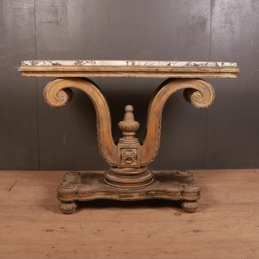 Elegant early 19th century faded gilt console table, 1810.

Dimensions
44 inches (112 cms) wide
15 inches (38 cms) deep
32 inches (81 cms) high.

 