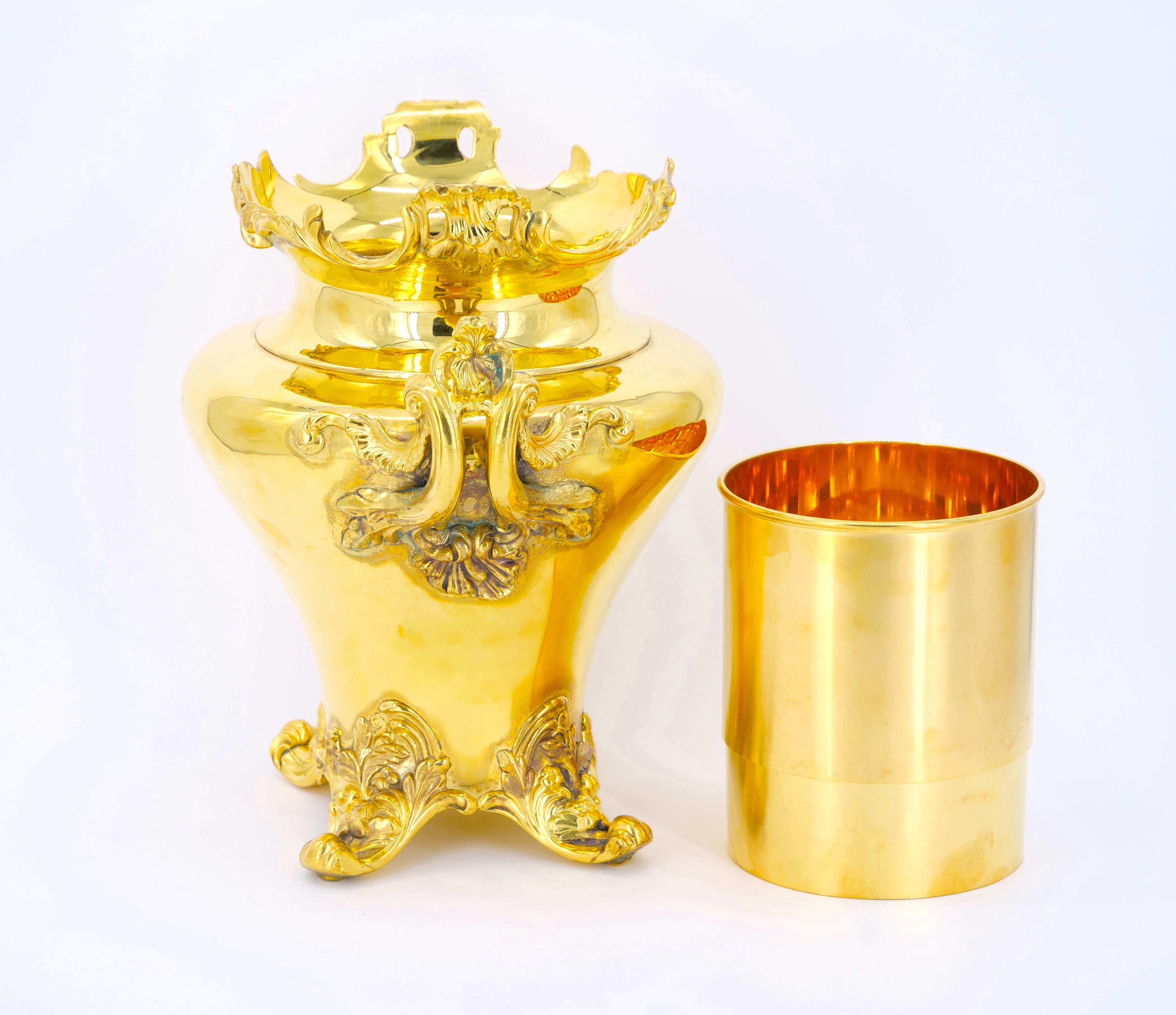 Elevate your entertaining with this exquisite Victorian Period English Gilt Silver Plate Champagne Cooler, a stunning piece of tableware and barware that exudes the opulence and elegance of the Victorian era. This champagne cooler is not just