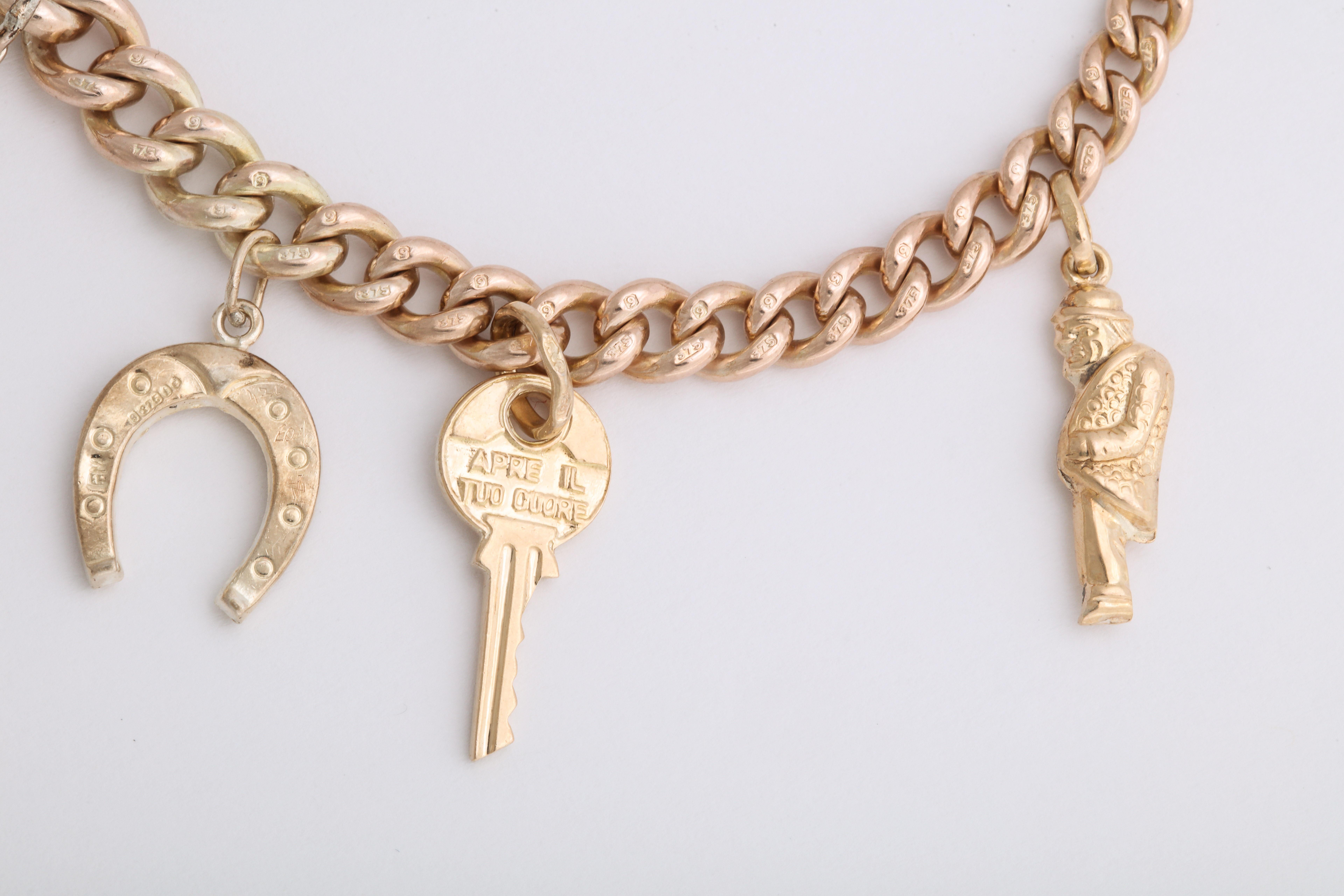 English 18k and 9k Gold Charm Bracelet, Birmingham, 1950s 2