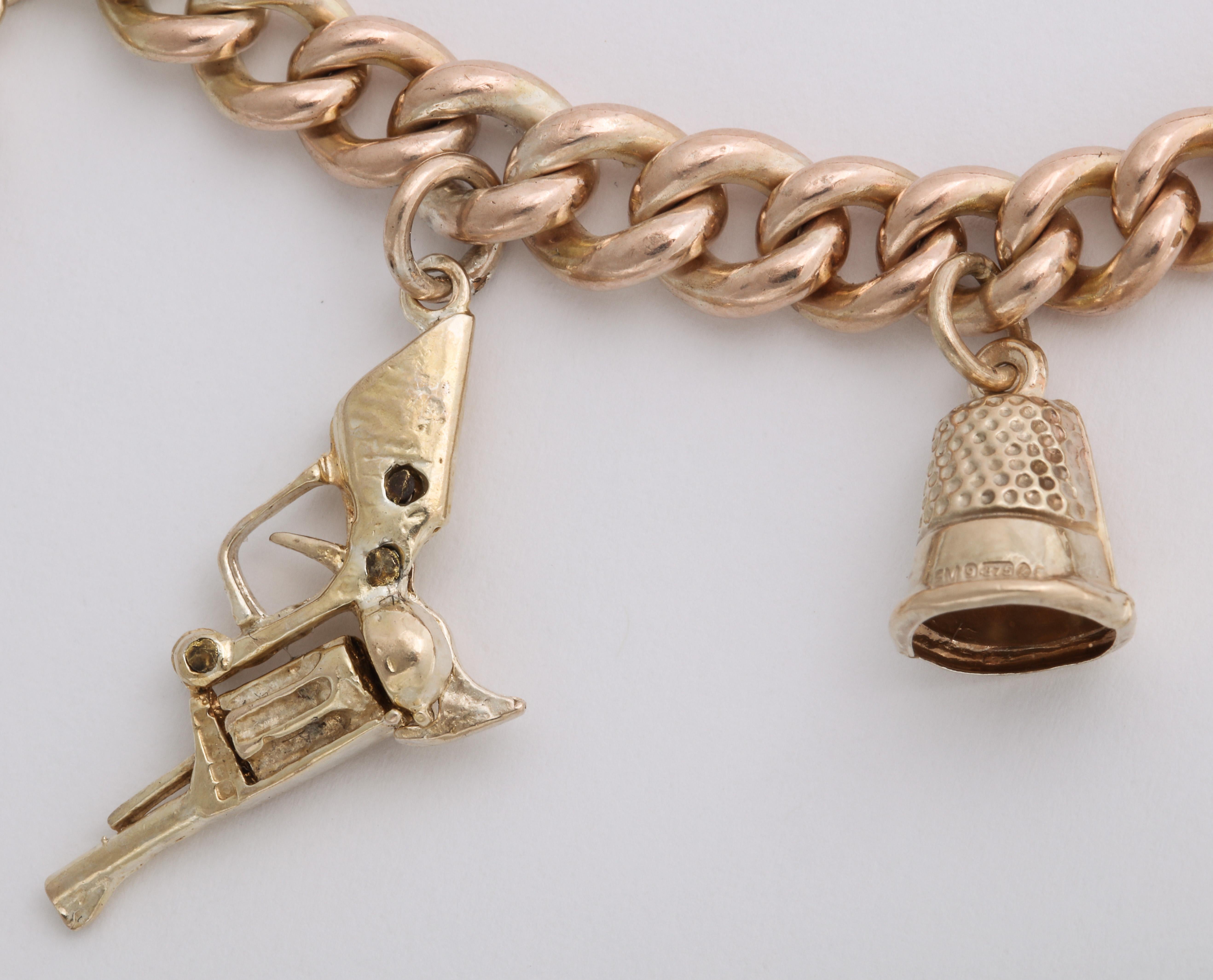 English 18k and 9k Gold Charm Bracelet, Birmingham, 1950s In Good Condition In St. Catharines, ON