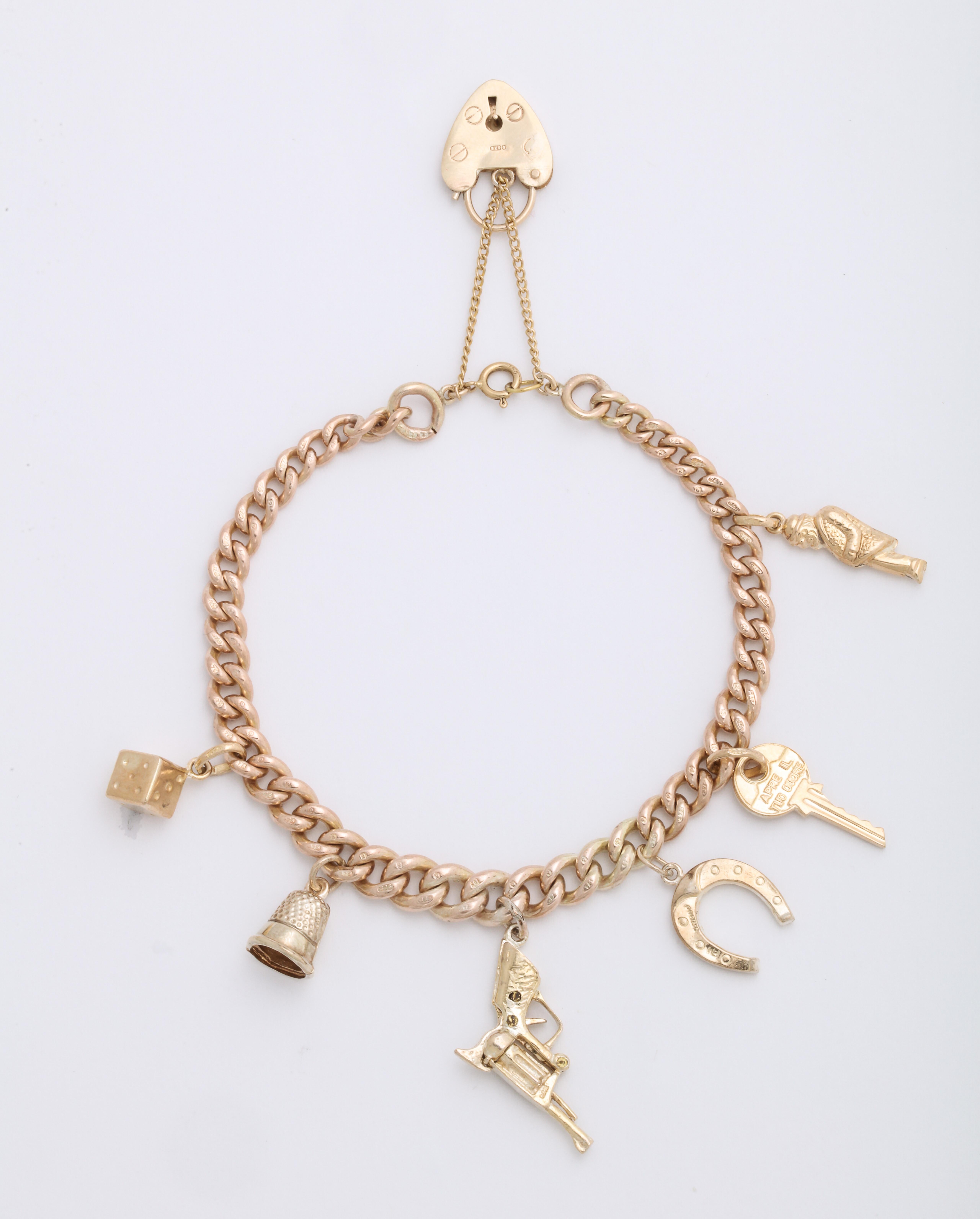 English 18k and 9k Gold Charm Bracelet, Birmingham, 1950s 1