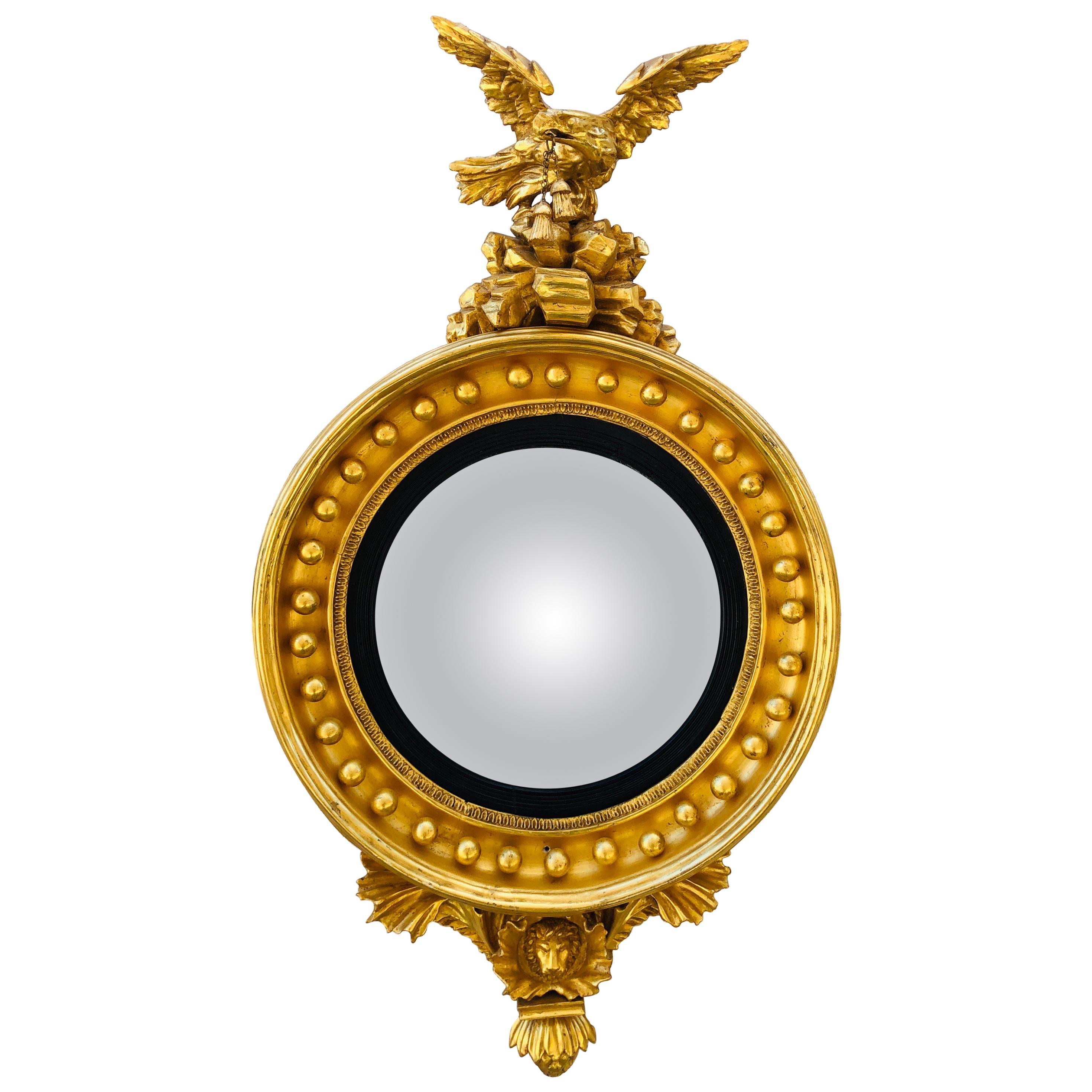 English Gold Gilt Convex Mirror with Eagle on Plinth and Lion at Base