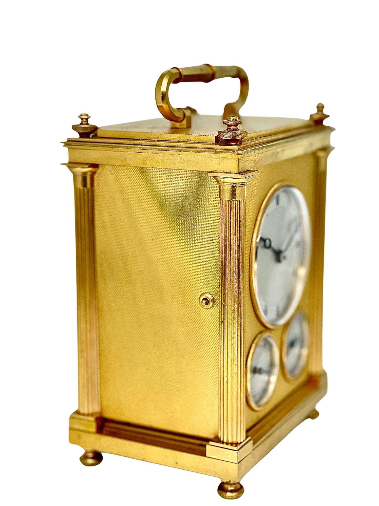 A beautiful English grande-sonnerie striking and calendrical carriage clock, with a carrying handle typical of carriage clocks from this era.

The English case is fine and substantially made, with fluted columns and and inset engine-turned panels
