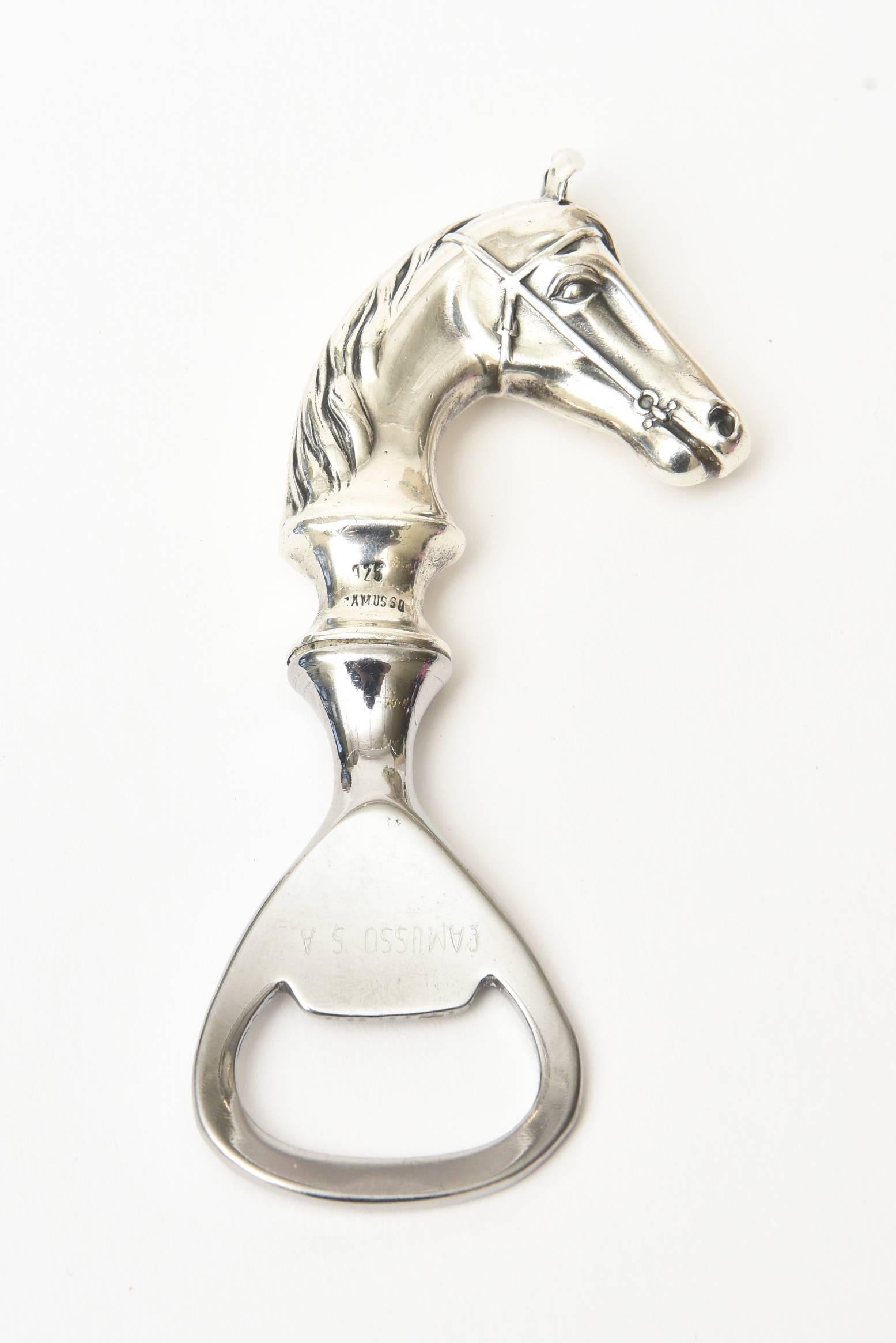This hallmarked English vintage sterling silver horse bottle opener/ barware is elegant and a great addition to any bar. It has good weight to it and well made.
For all the horse lovers of the world, this makes a great gift to oneself or others.
