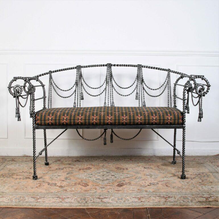 Vintage Regency Style Swag and Tassel bench, handmade by the “Maitland Smith” group. Twisted wrought iron with rope detail and custom upholstered seat. 