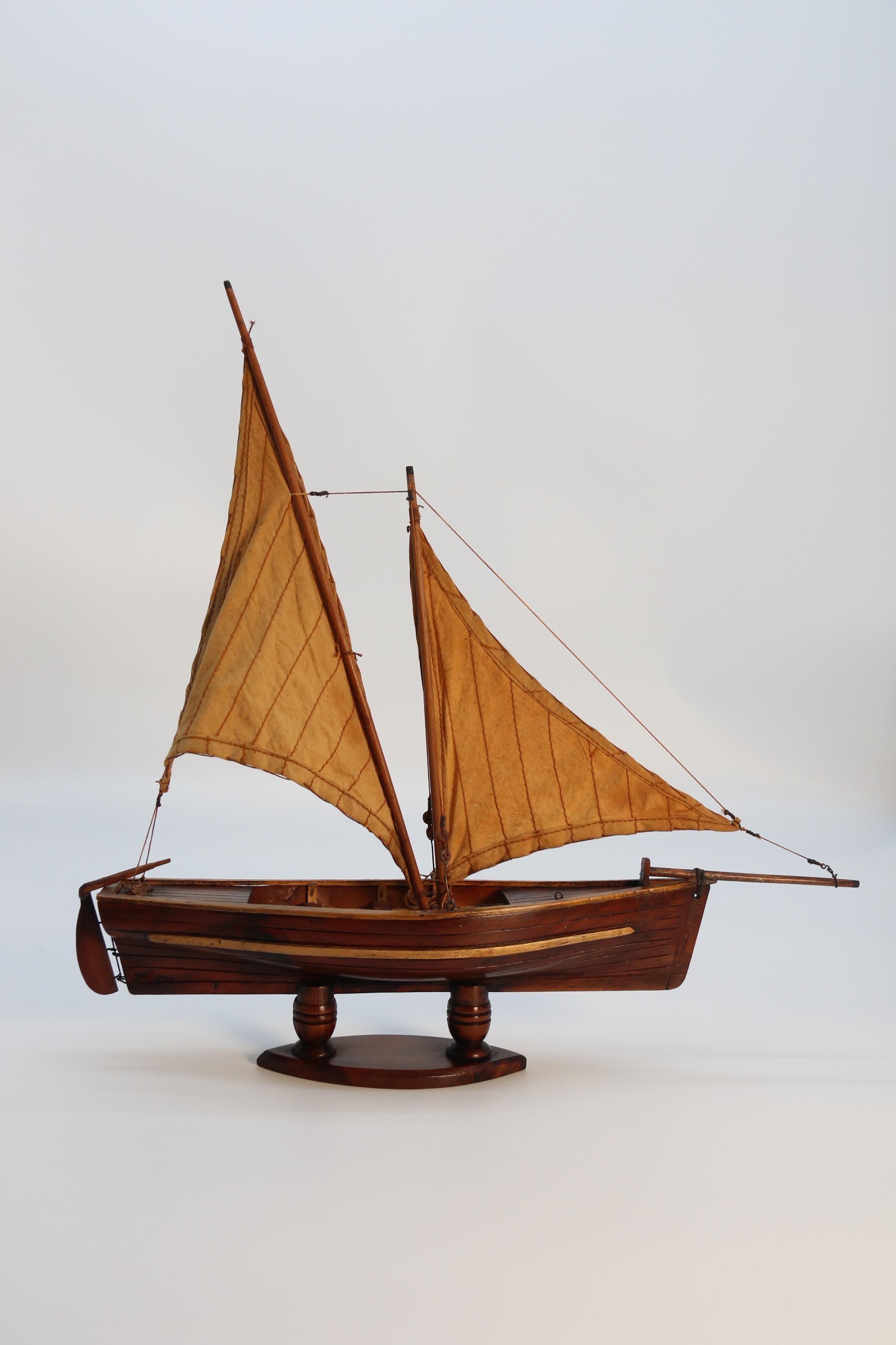 Early 20th Century English handmade yew wood model of 19th century sailing boat, circa 1900