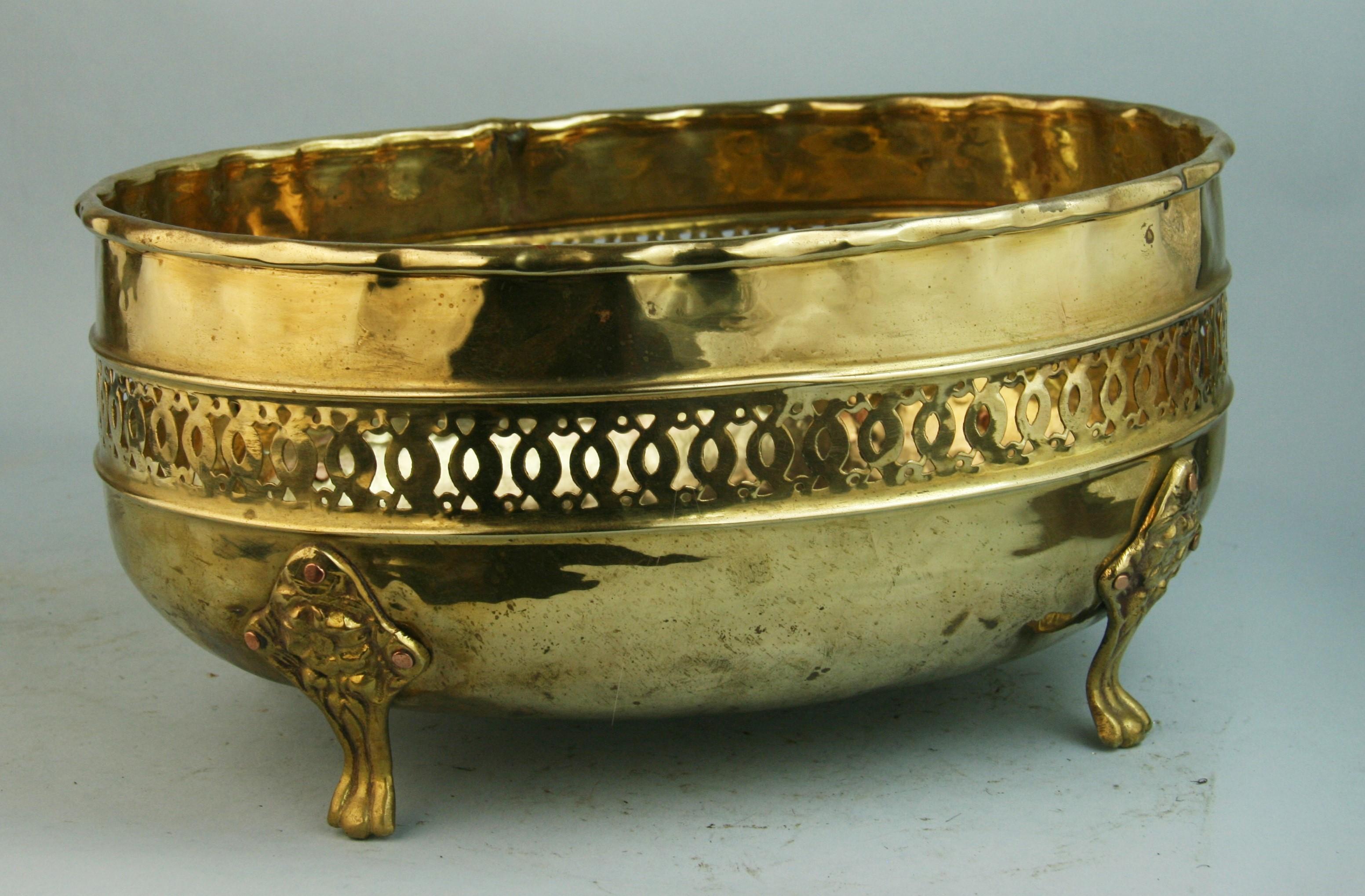 1241 Hammered brass finely detailed cache pot.