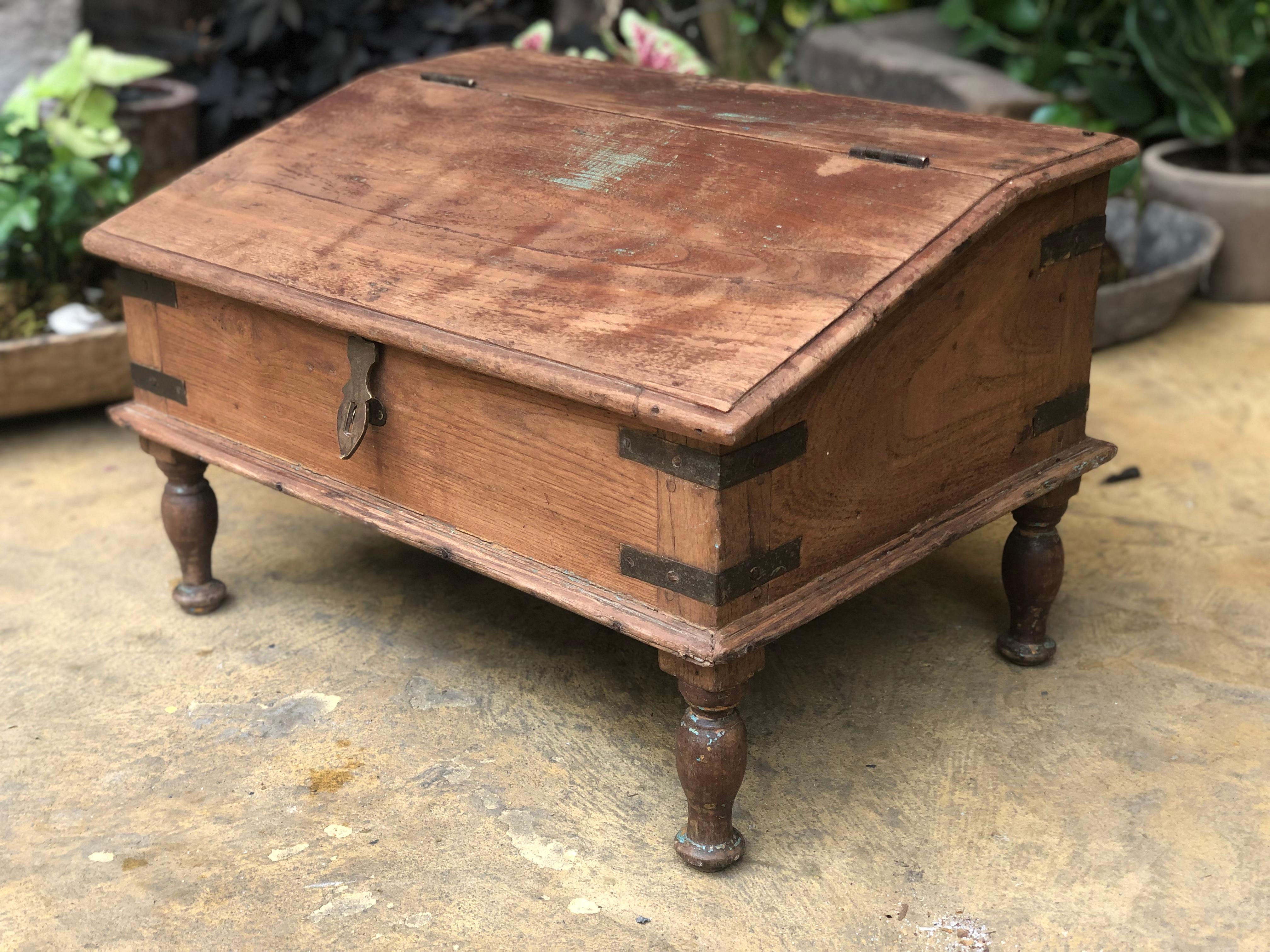 English country portable writing desk with lifting writing surface, it has its original bronze ironworks, late 18th century.