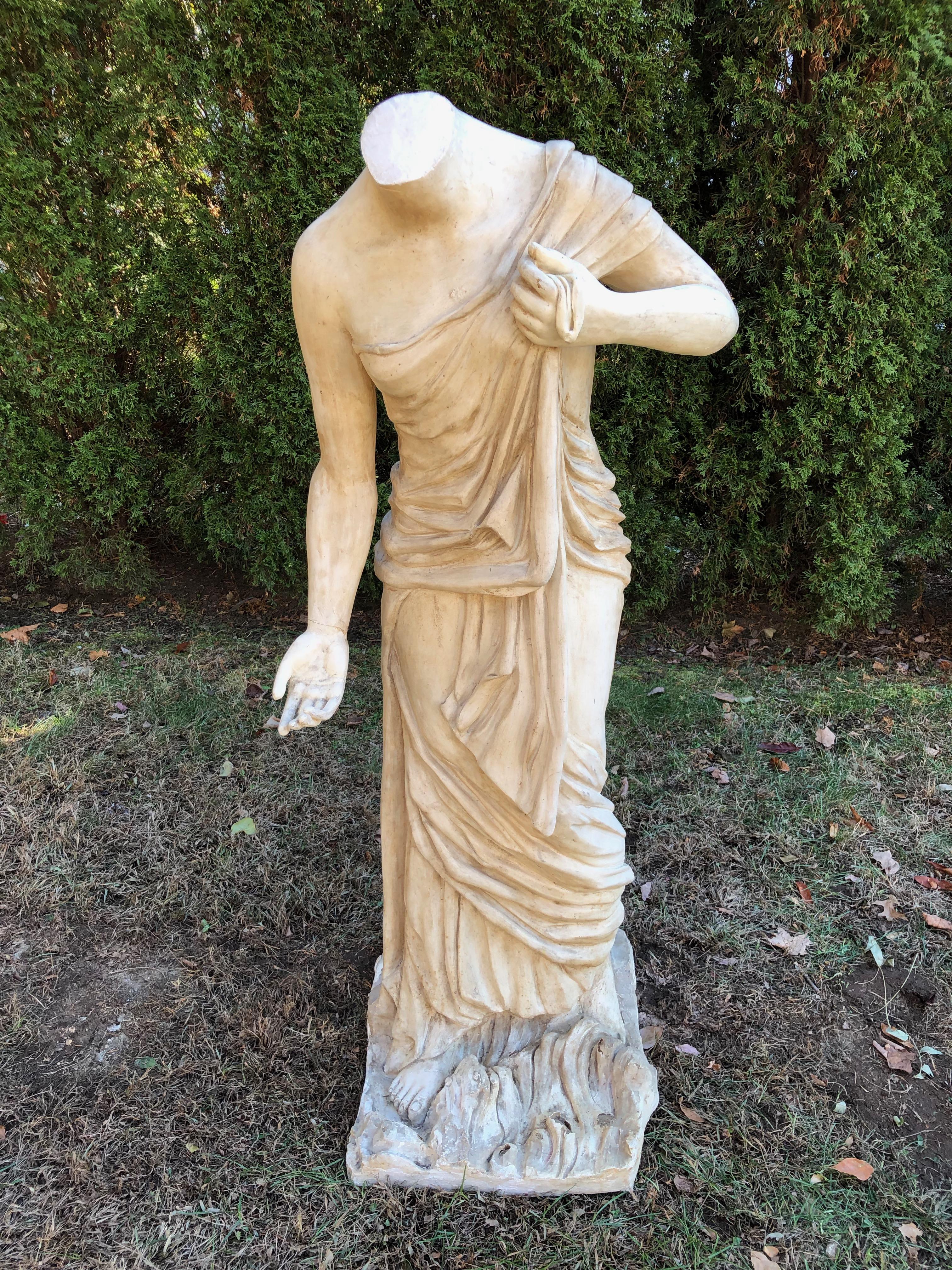 We love all forms of classical statuary, and this unusual piece is fabricated from resin, so she probably was an indoor piece or movie prop originally. Very lightweight, and in overall good vintage condition, there are some losses to the 