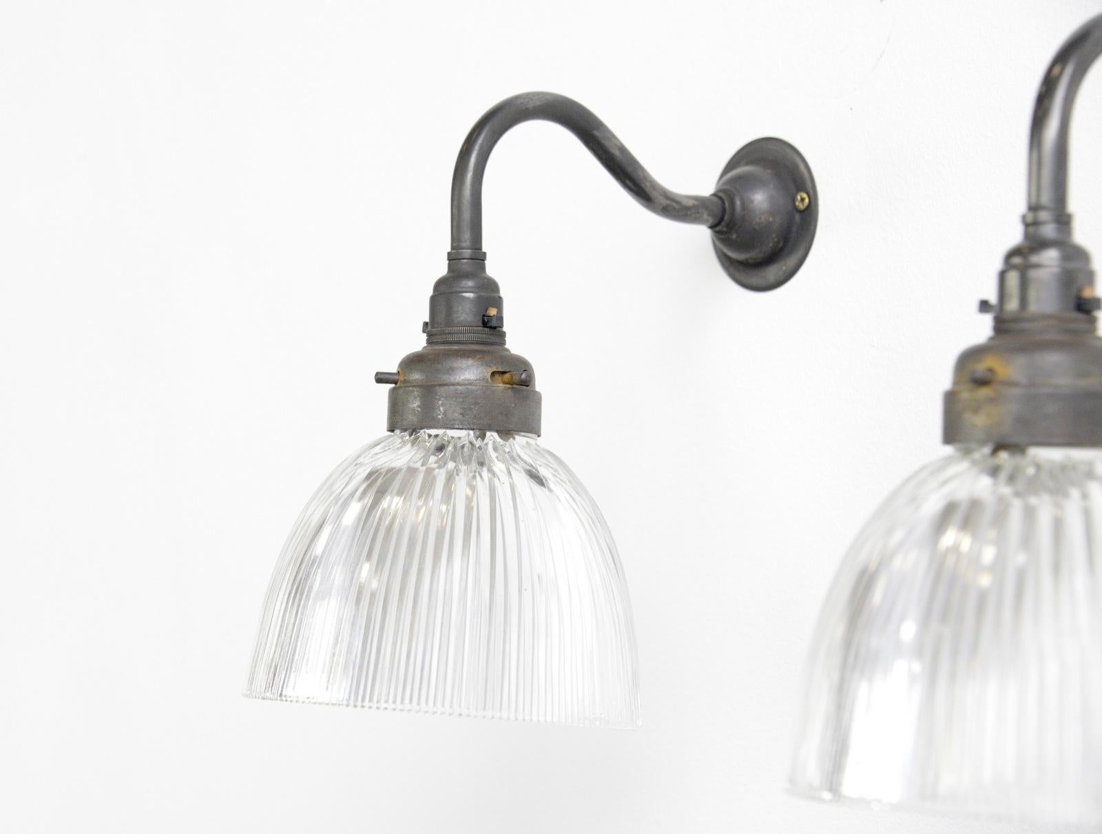 English Holophane wall lights, circa 1920s

- Price is for the pair
- Prismatic glass shades marked 