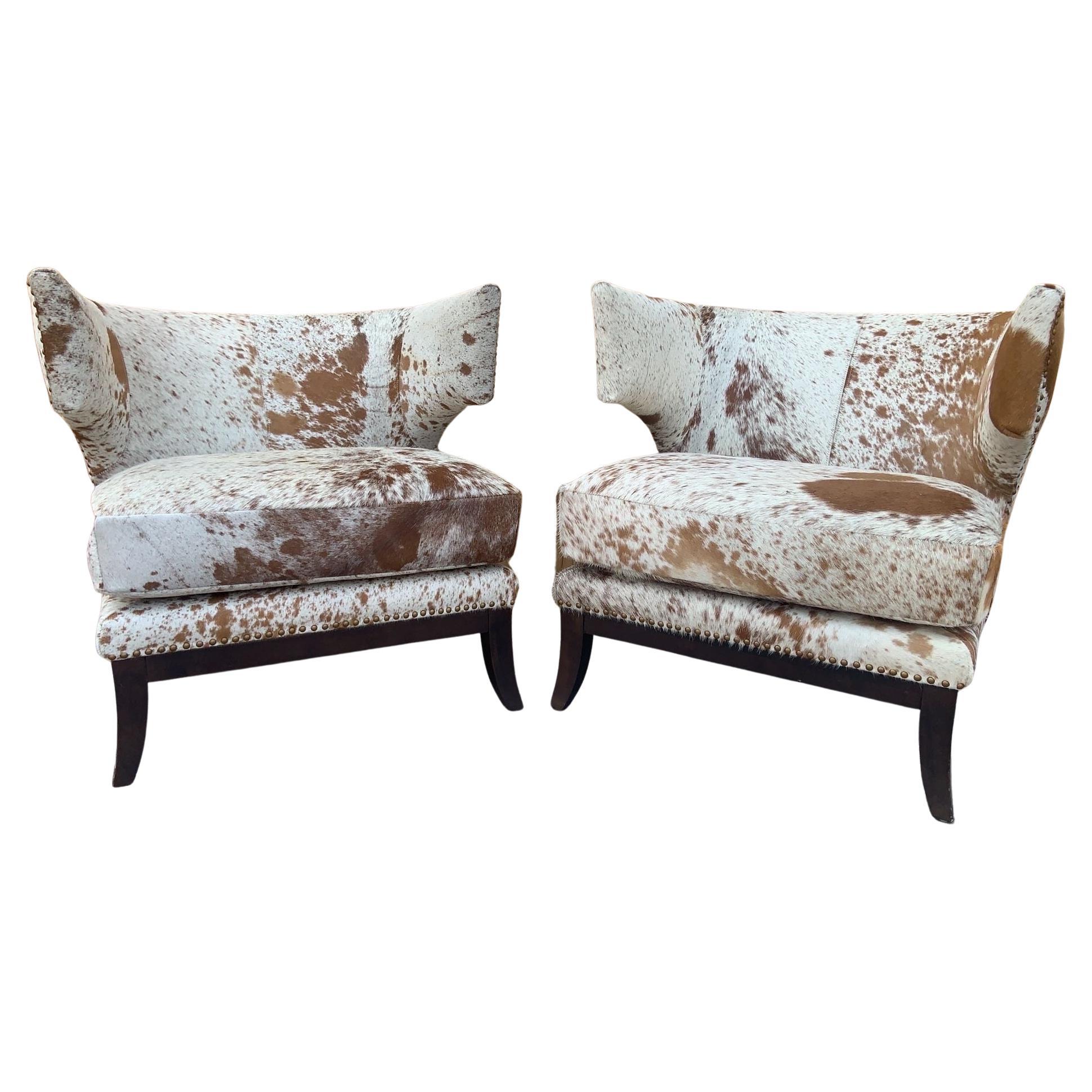 Vintage English Horseshoe Back Savoy Chairs Newly Upholstered in White & Brown Brazilian Cowhide

Gorgeous Vintage Set of English Horseshoe Back which were Newly Upholstered in White with Peppered Brown Hair-on Brazilian Cowhide. The Savoy chairs