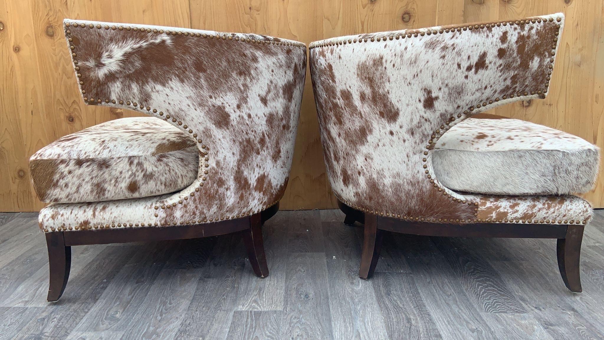 Late 20th Century English Horseshoe Savoy Chairs Newly Upholstered in Brazilian Cowhide - Set of 2