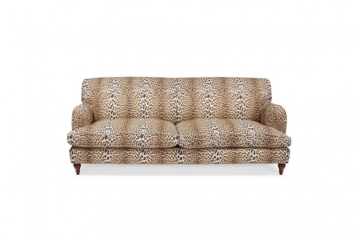 A stunning English Howard sofa, 20th century.

Classic English style design, the Howard has been the best selling model in the UK for over 110 years. Traditionally upholstered with feather and down, the Howard has fixed hand sprung back and loose