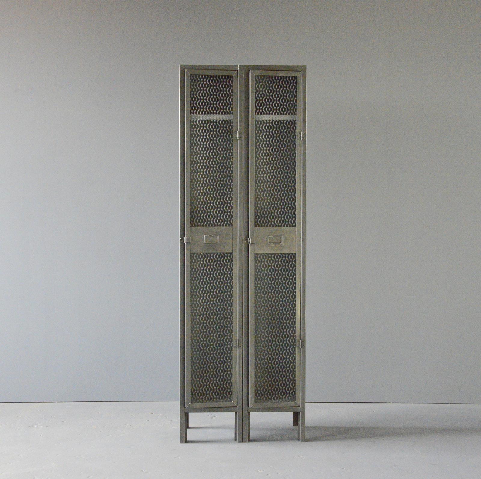 English Industrial Lockers circa 1940s

- Sheet steel with mesh front doors
- 2 Doors
- Each compartment has hanging hooks and shelf
- Salvaged from an engineering works in Birmingham
- English ~ 1940s
- 61cm wide x 31cm deep x 182cm