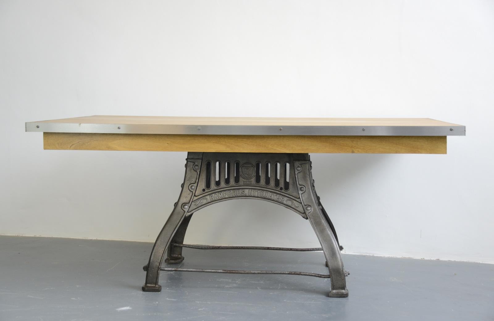 English industrial table by Bamfords, circa 1910

- Will seat 6-8
- Cast iron base
- Beautiful bradning on all 4 sides
- Steel edging 
- Solid hardwoood top
- The top is made from Idigbo 
- The top has been finished with numerous coats of
