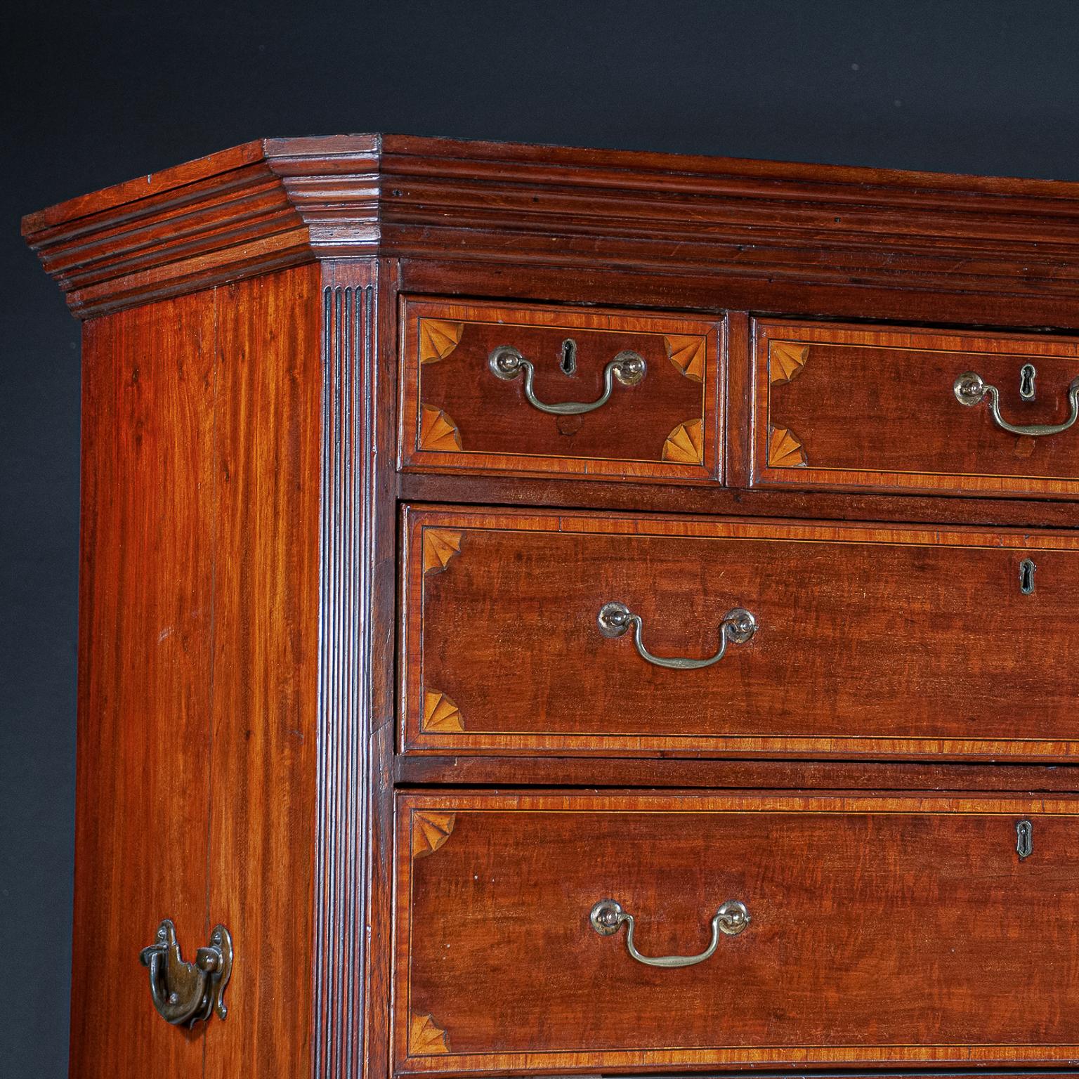 English inlaid chest on chest w/secretary drawer
A Sheraton mahogany chest on chest with secretary fitted drawer (notice the brass drop-down support). This is one of the better ones we've had in some time. Impressive in appearance with striking