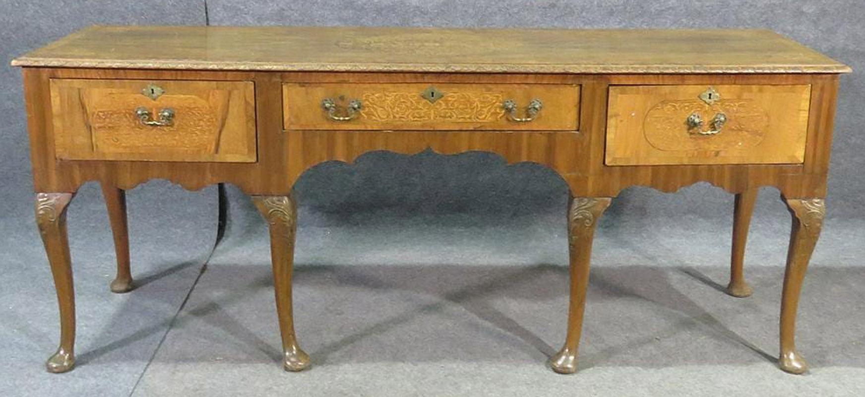 Beautiful Seaweed inlay. English. Walnut. 3 dovetailed drawers. Brass hardware. Carved. Measures: 32