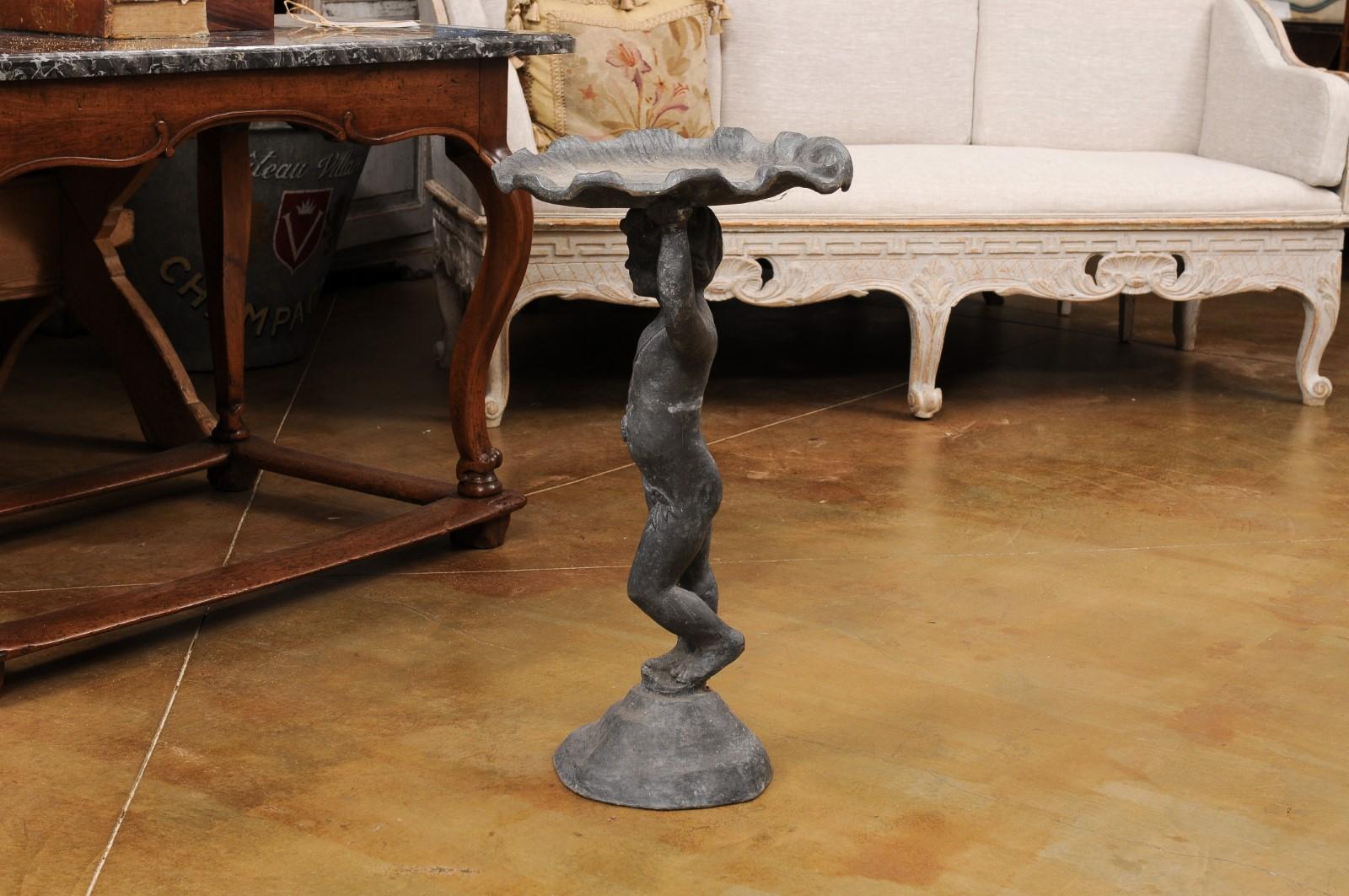 English Iron Greco-Roman Style Standing Cherub Carrying a Sea Shell Bird Bath For Sale 7