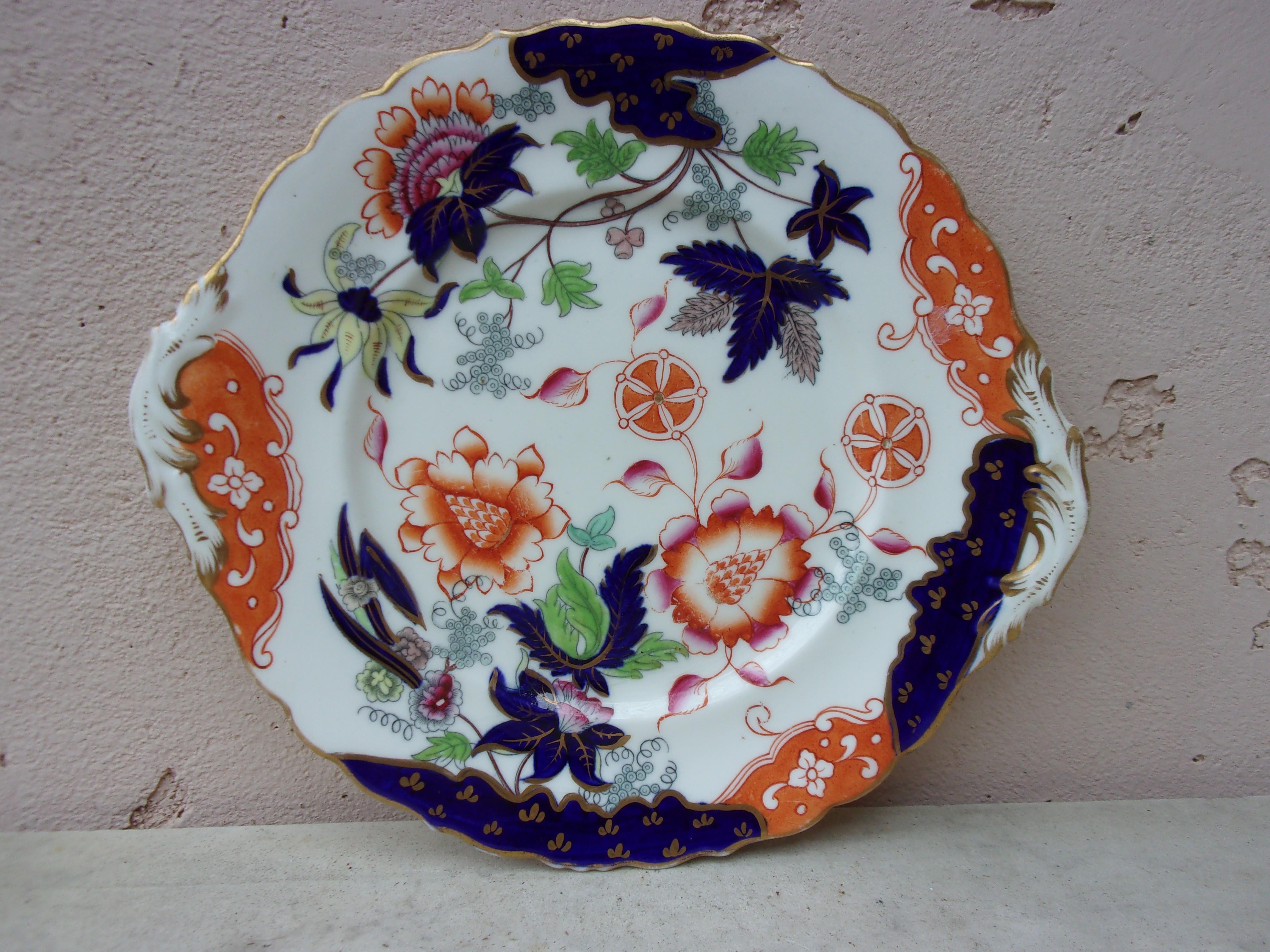 English ironstone platter circa 1890.
Chinoiserie or Imari style, decorated with flowers.