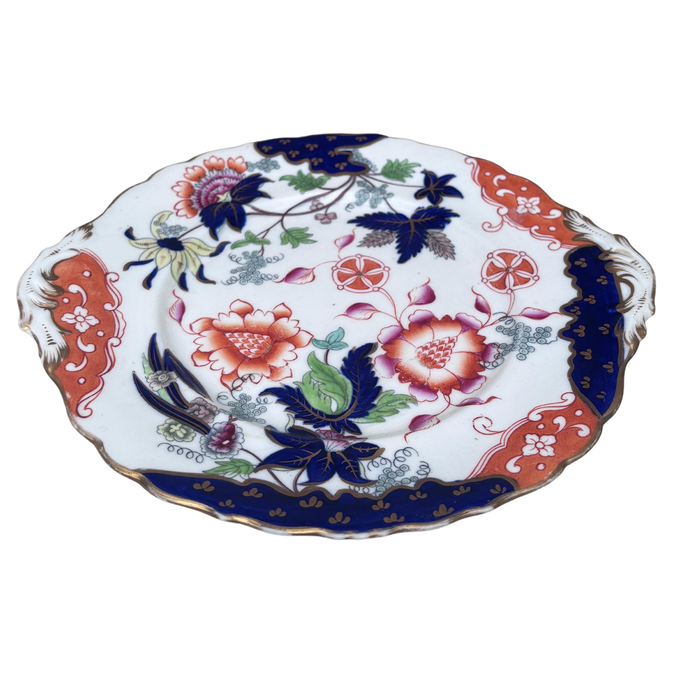 Plat anglais en pierre de fer vers 1890.
Style Chinoiserie ou Imari, décoré de fleurs.