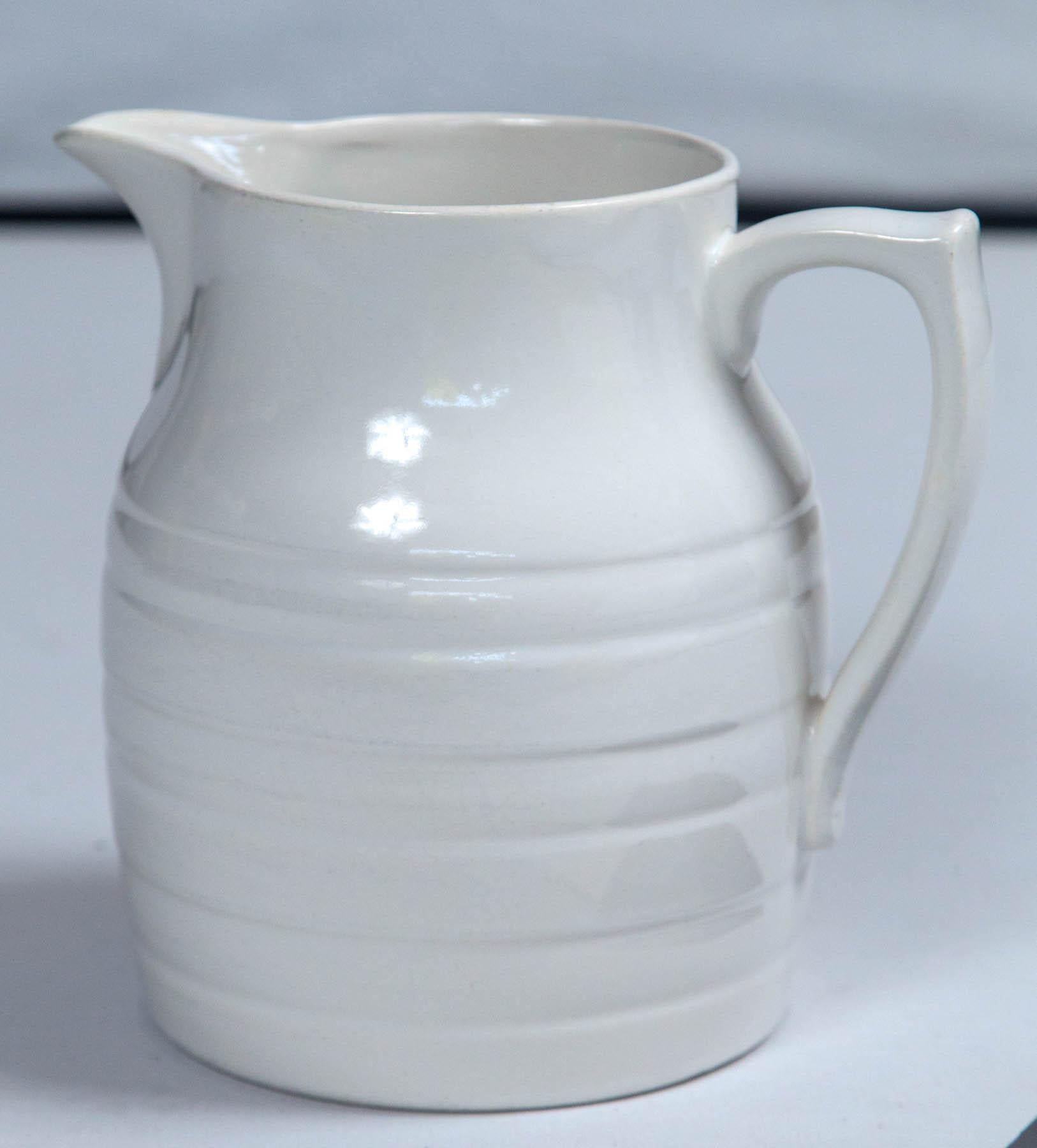 English ironstone dairy pitcher, circa 1920. Extra large size, classic vintage form. Manufactured by Sadler, Staffordshire, England.



 