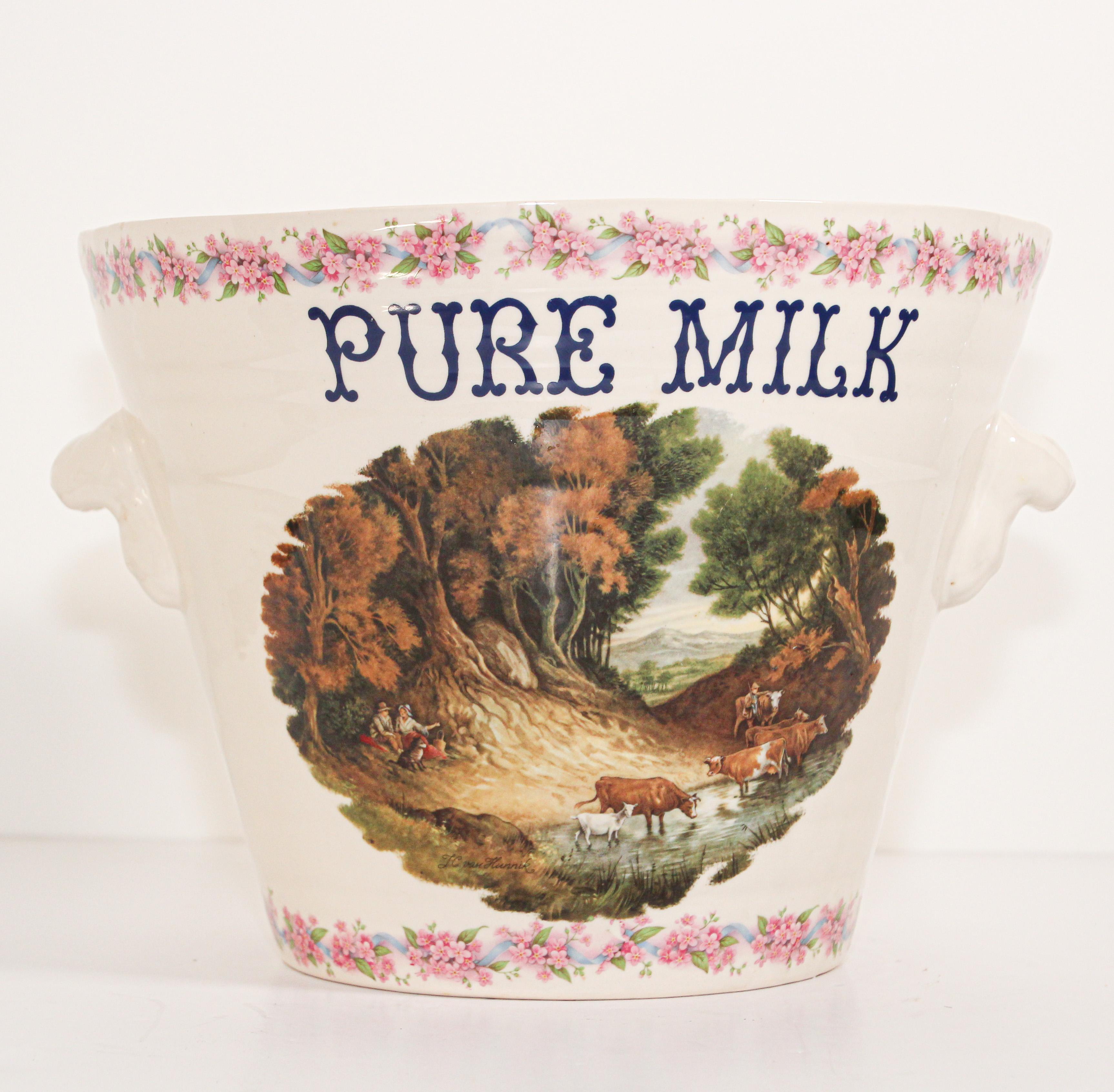 All time lassic large English ironstone Pure Milk pail, made for the Co-operative Society printed with the Classic image of two cows in a field.
Used during the Edwardian period of the late 1800s, early 1900s, and used in grocery stores and