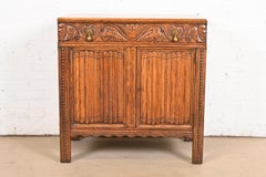 English Jacobean Carved Oak Buffet Server or Bar Cabinet by Irwin, Circa 1920s
