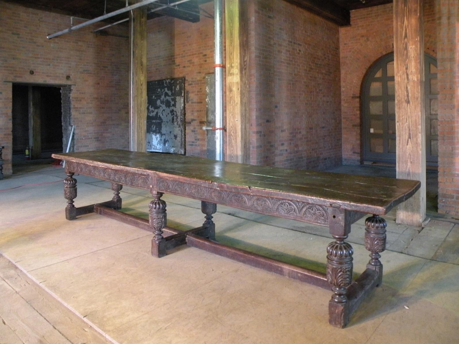 English Jacobean Early 17th Century Oak Refectory Table of large proportions, extraordinary and rare for its H-form stretcher configuration, which enables more comfortable sitting and dining, having the stretchers in the middle and not around the