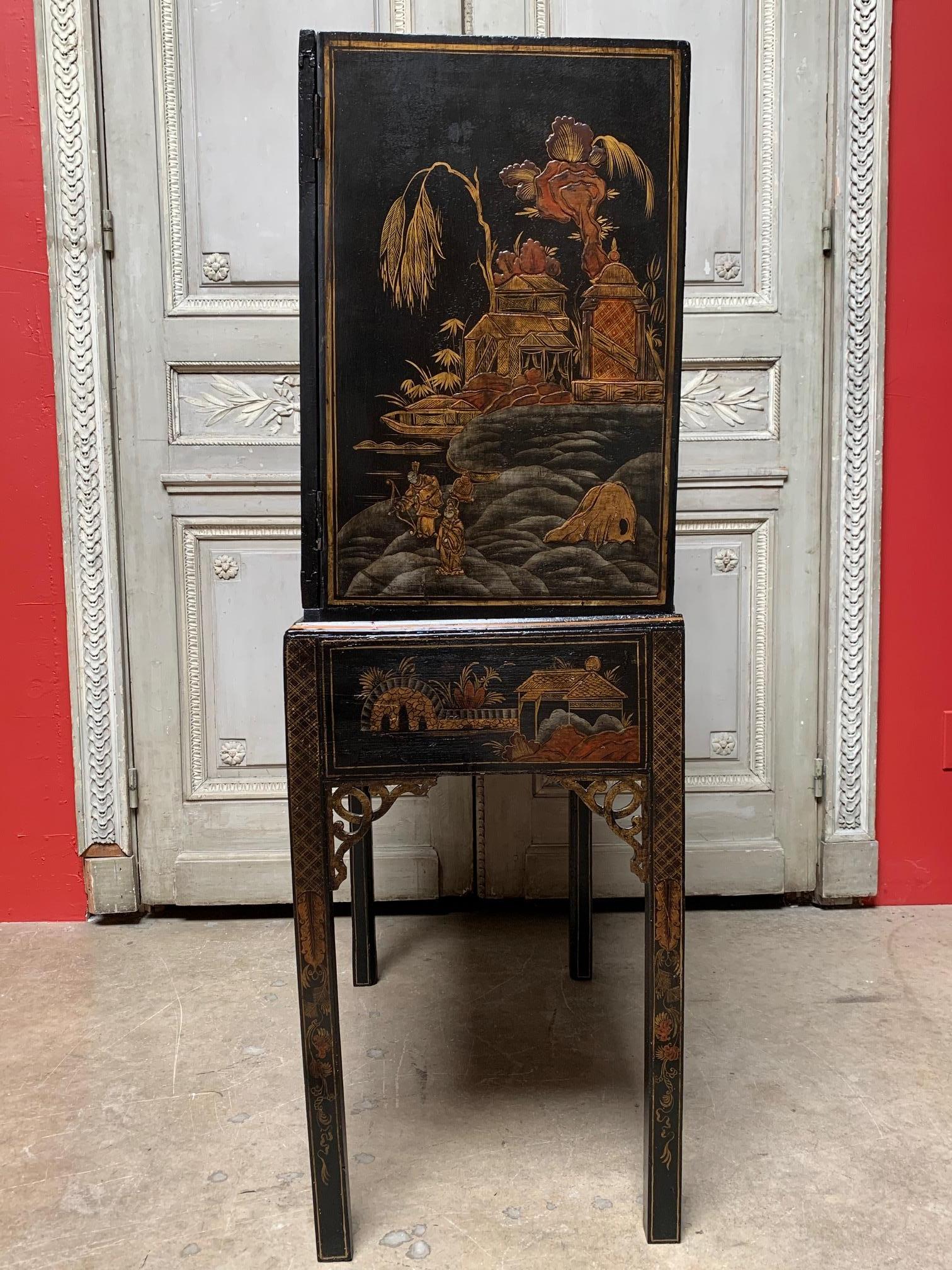 Chinoiserie 19th Century English Chest on Stand with a Black and Gold Lacquered Finish