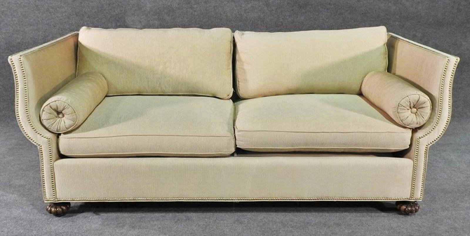 This is one of a matched pair. This is a grand, extremely comfortable sofa. You can easily sleep on this sofa and feel comfortable. The sofa is in good condition with the most minor signs of use. Measures: 34 1/2