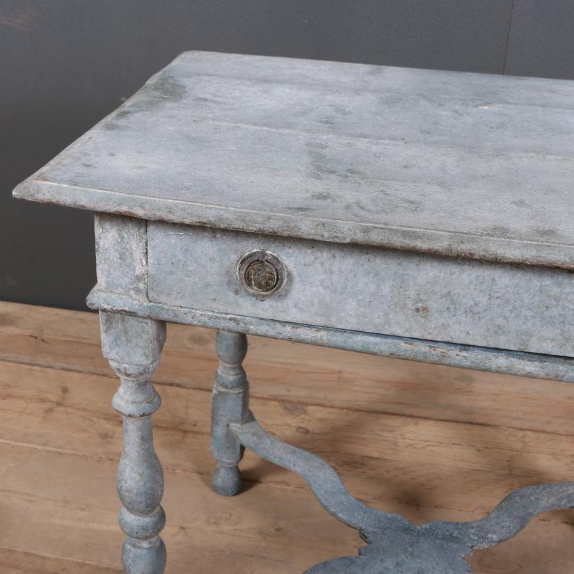 18th century painted English oak lamp table, 1780.

Dimensions:
28.5 inches (72 cms) wide
20.5 inches (52 cms) deep
26.5 inches (67 cms) high.

 