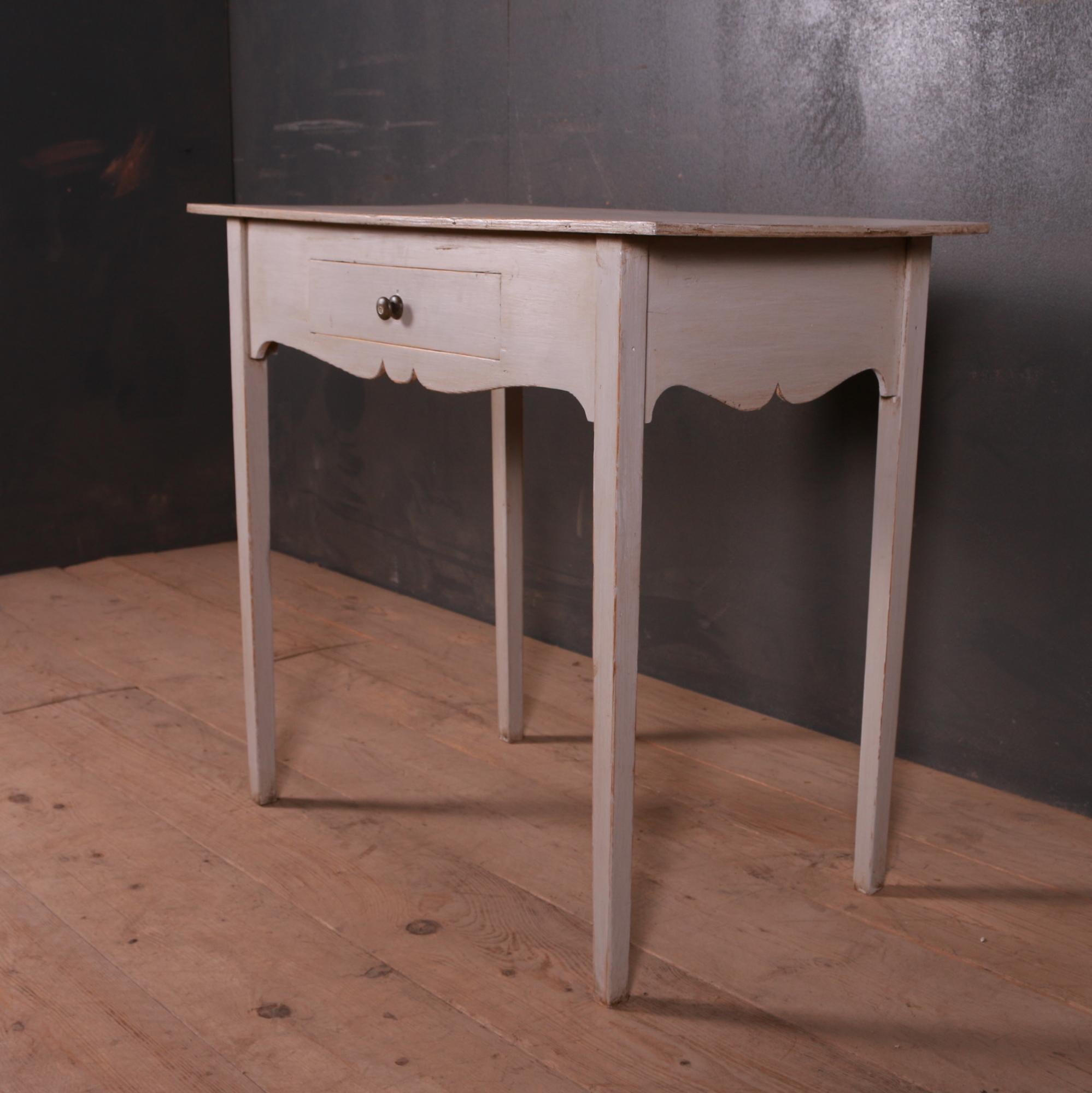 Early 19th century painted one drawer lamp table, 1830.

Dimensions
34.5 inches (88 cms) Wide
18 inches (46 cms) Deep
29.5 inches (75 cms) High