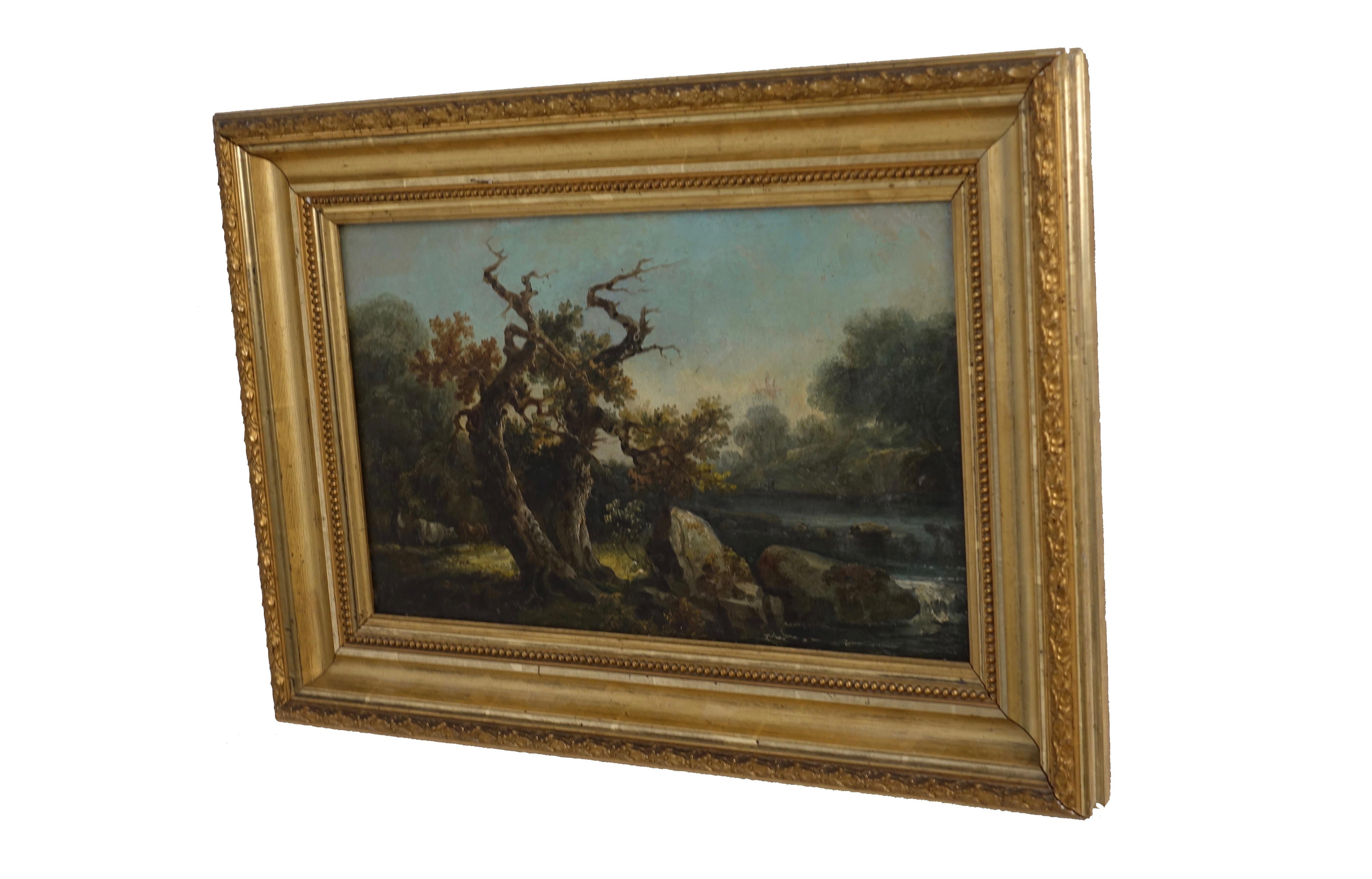 A bucolic landscape painting of cows grazing by a stream. Oil on canvas, unsigned, in giltwood frame. England, 19th century.
