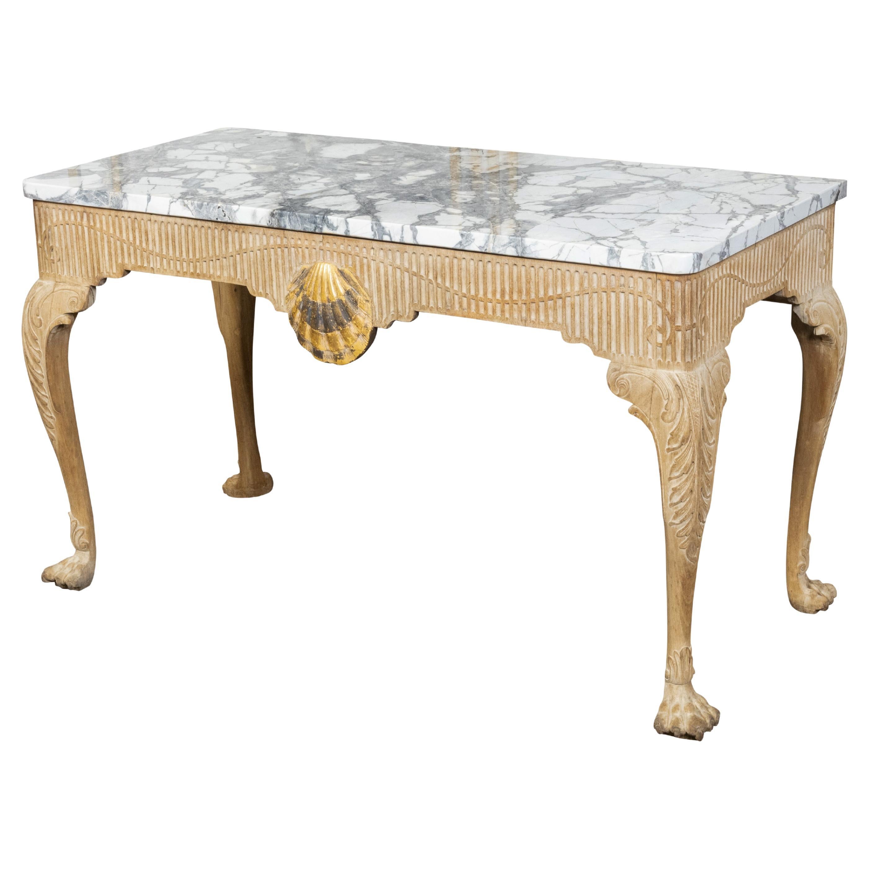 Table console anglaise de la fin du XVIIIe siècle avec plateau en marbre et tablier sculpté