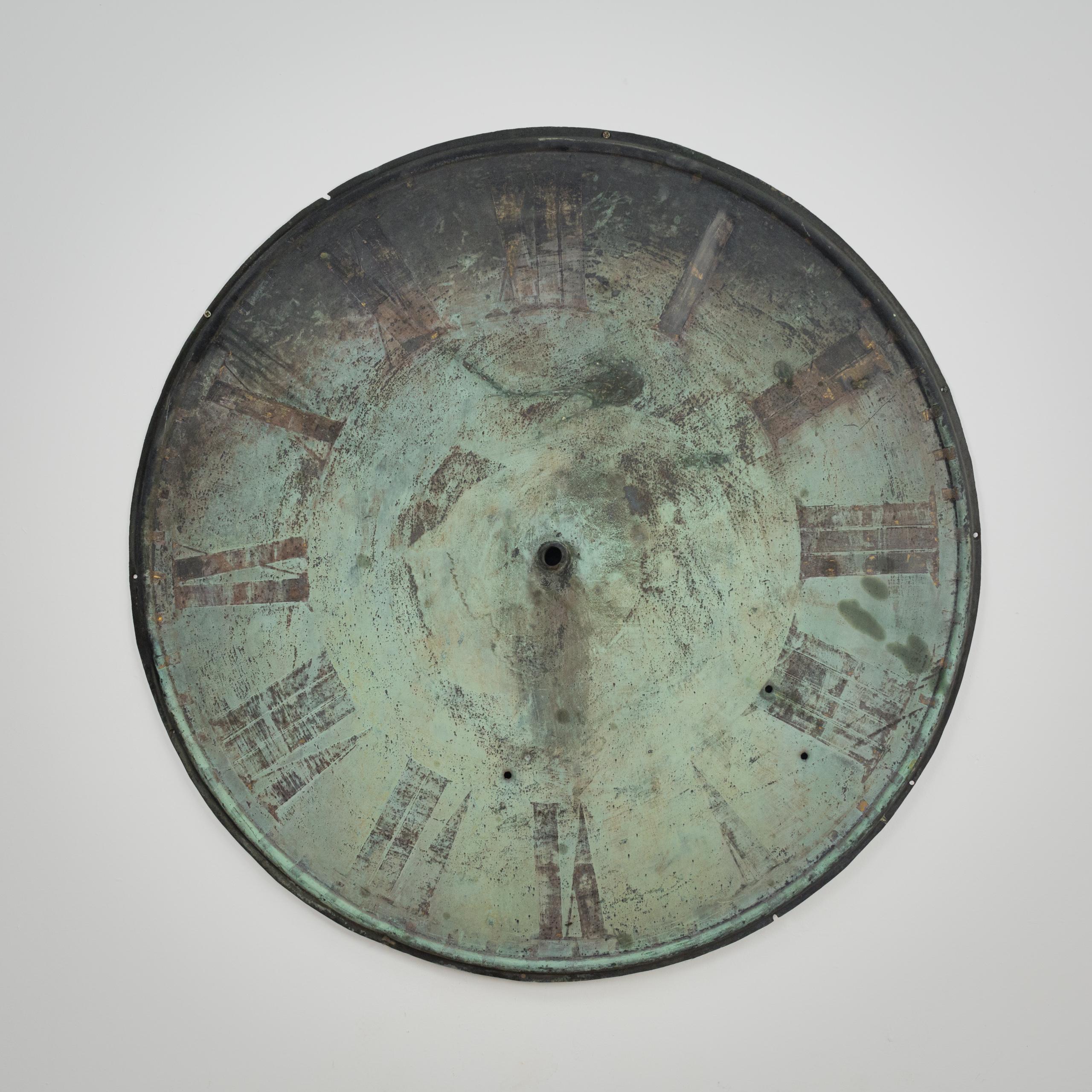Impressive Late 19th Century Copper Tower Clock Face boasting a stunning verdigris patination and spectacular ghostly weathered appearance. reflecting decades of weathering and history. Feint remaining numerals contrast beautifully against the rich