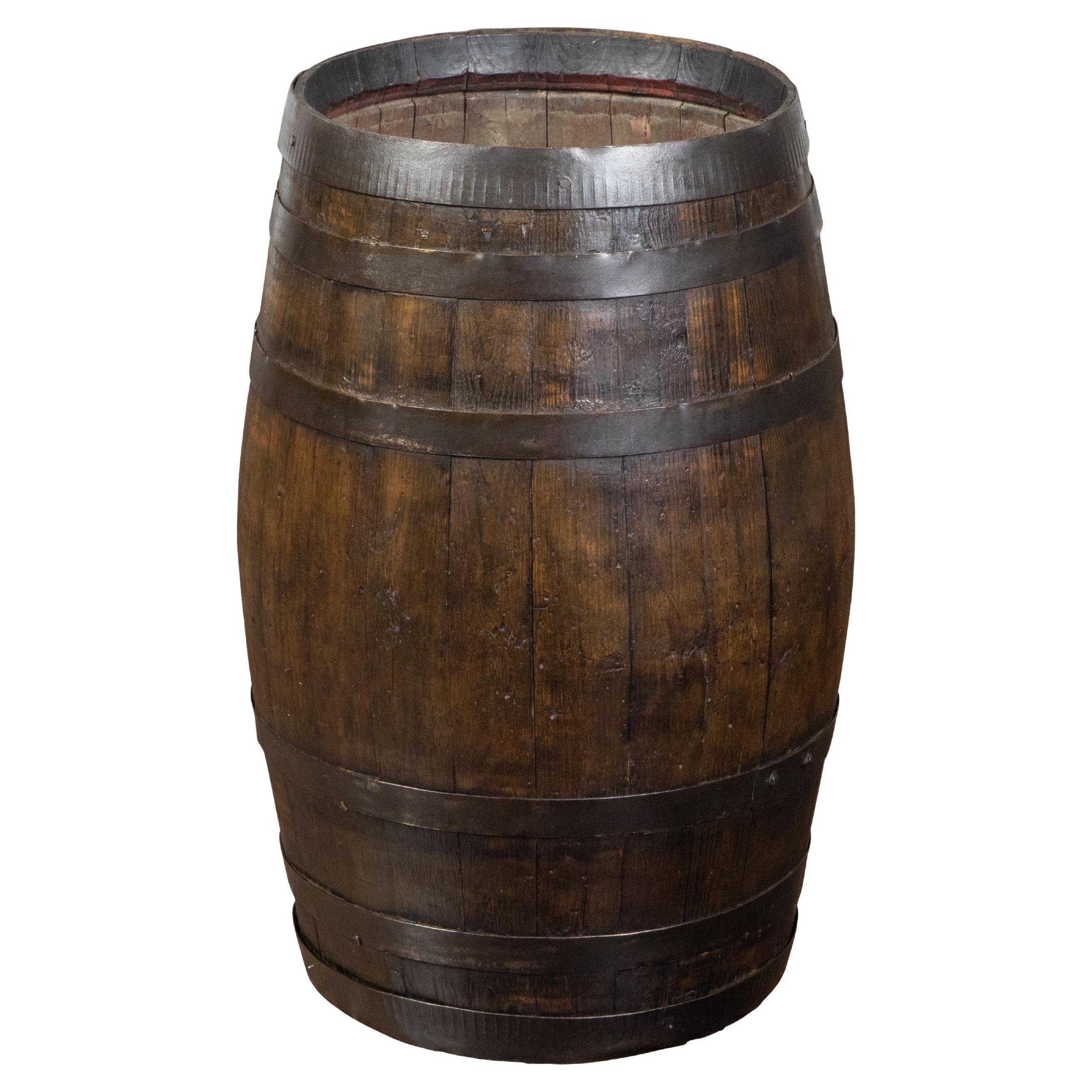 English Late 19th Century Oak Barrel with Iron Braces and Dark Patina For Sale