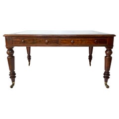 English Late Regency Double-Sided Mahogany Library Writing Table, circa 1830