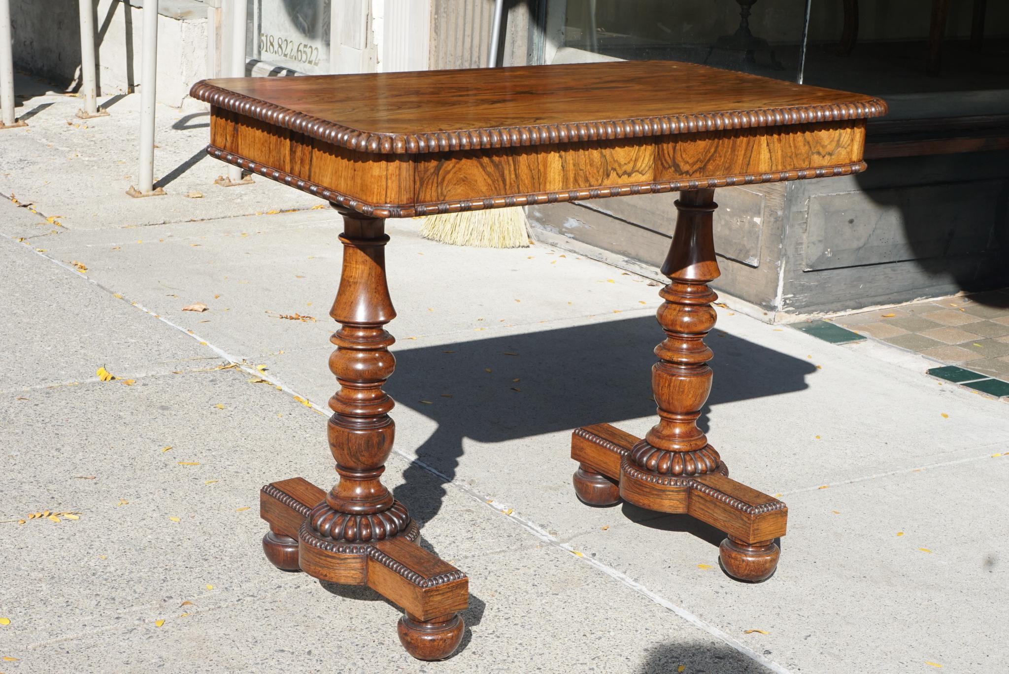 This table retains a fine old faded rosewood finish and bears striking similarities to a Gillows table of 1825 listed in Judith & Martin Millers Antiques Directory of Furniture published in 1995. The legs support entirely turned from the solid