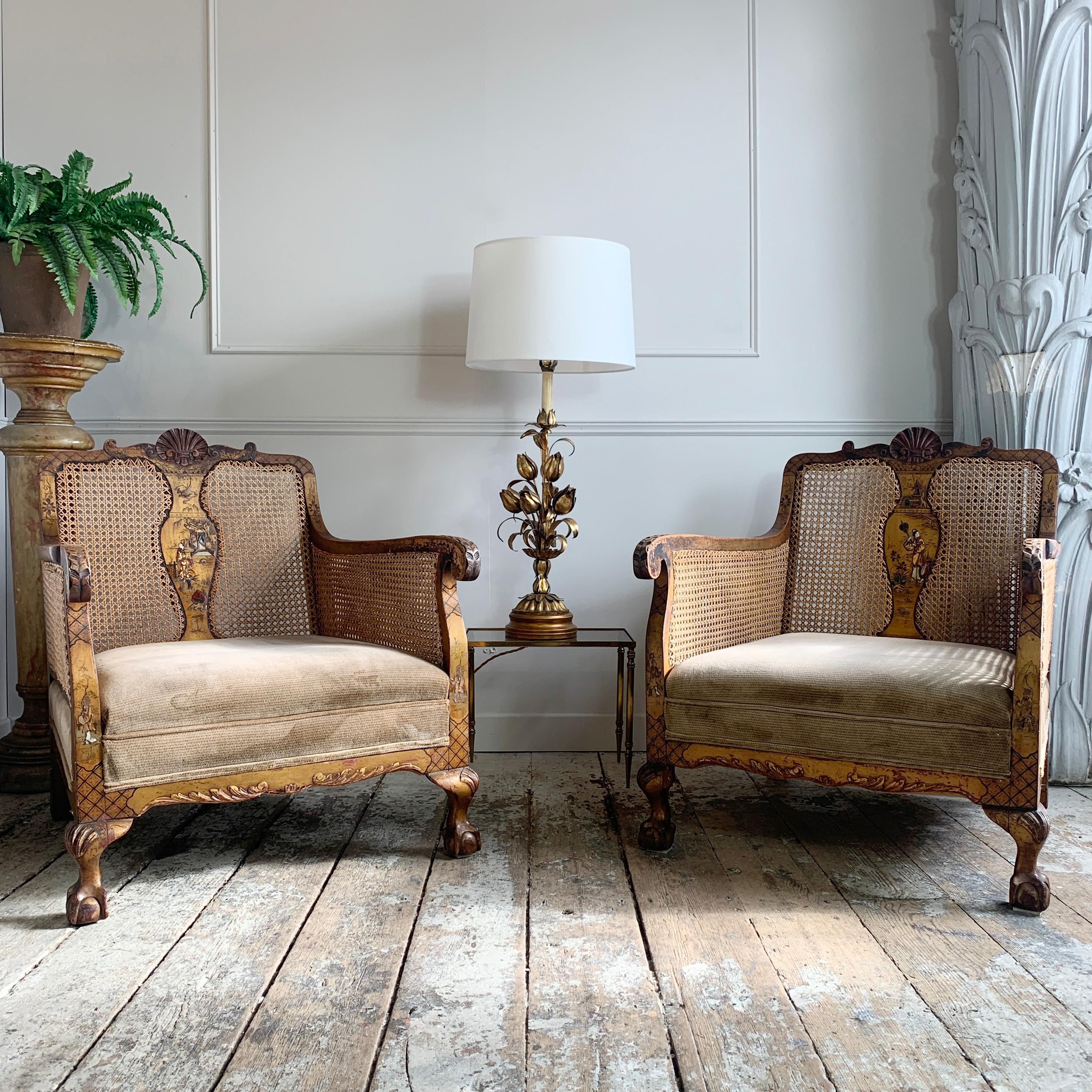 An exceptional and rare antique English later Victorian chinoiserie three-piece wooden bergere cane suite, circa 1885, in excellent antique condition. The suite is comprised of a three-seat settee with two matching armchairs and is constructed of