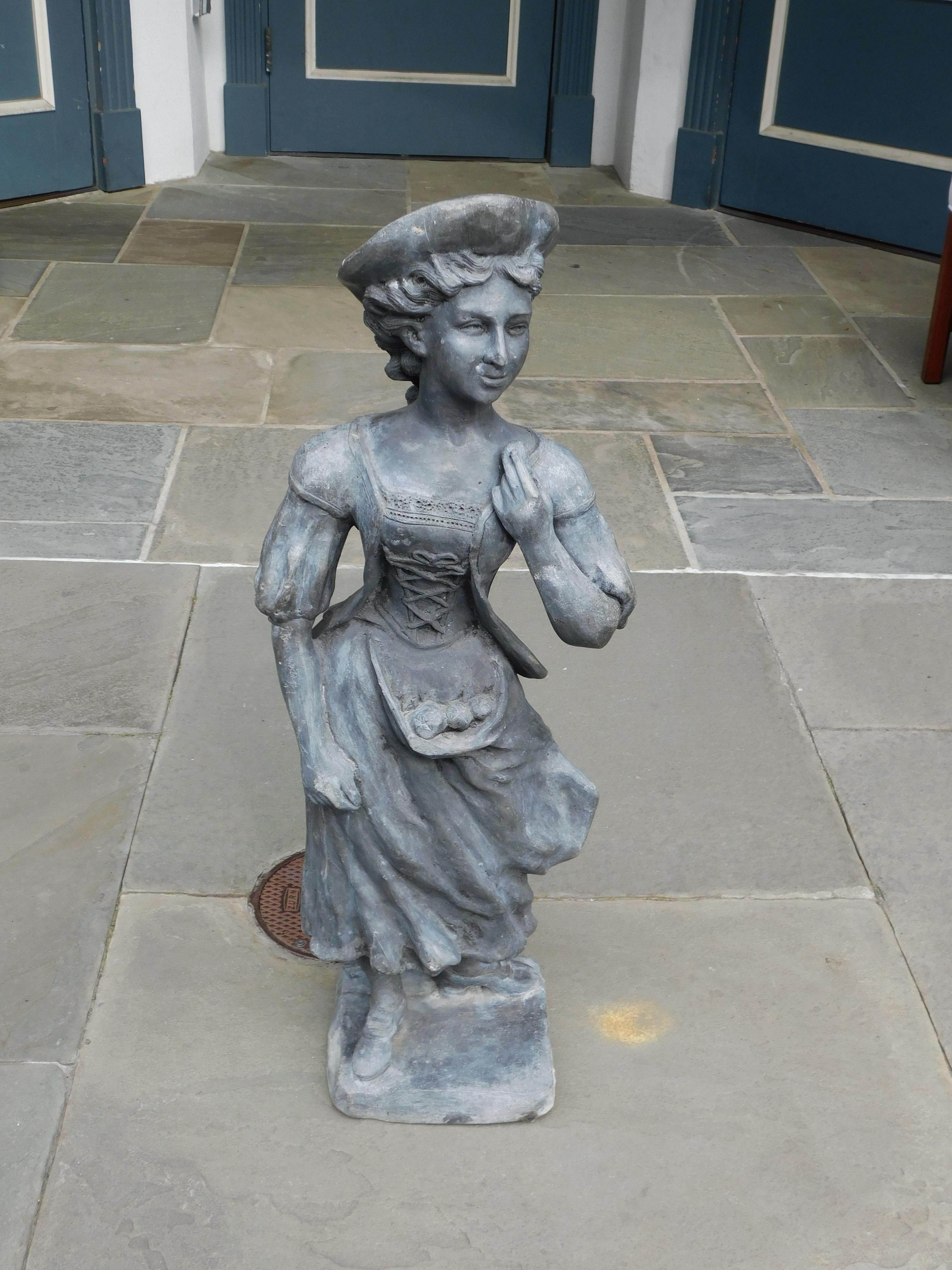 English lead figural lady garden statue standing on squared plinth. mid 19th century.